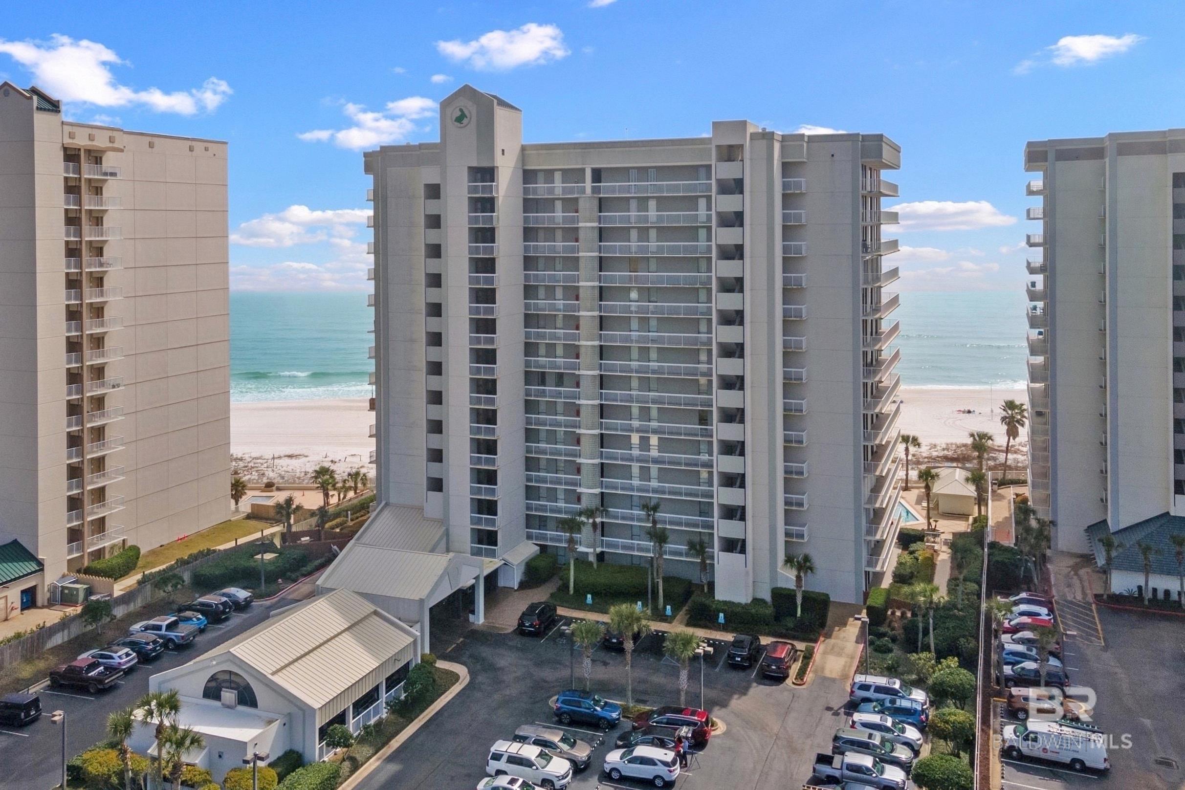 Own a slice of paradise in Orange Beach at Pelican Pointe's unit 104! This ground floor, gulf front condo allows gorgeous views and effortless access to both the pool, the white sandy beach and the Gulf! Enjoy coastal living in this decorated and fully furnished 3 bedroom, 2 bath condo. Enjoy morning coffee and breathtaking sunsets from the oversized covered patio. Condo features an open-concept living/dining area with lots of natural light as well as plenty of space for entertaining and relaxing after a day at the beach. Well-appointed kitchen offers granite counters and white cabinets. Spacious layout. Washer and dryer in hall closet. Pelican Pointe has a generous private beachfront along with resort style amenities such as indoor & outdoor pools, hot tub, fitness center, tennis court, BBQ area and more. Direct beach access! Guard at gate. This condo is an ideal investment for personal use and/or a high-performing rental property. 84 total units in building. 2 owner parking passes. Guest parking is $50/day. Buyer to verify all information during due diligence.