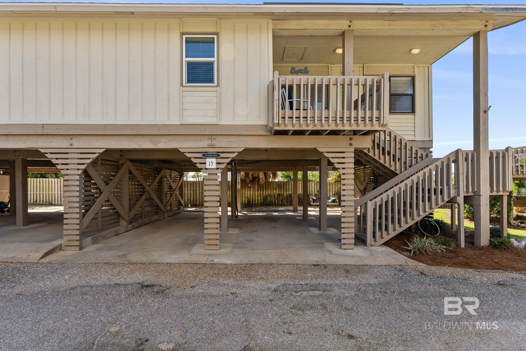 Gulf Village Unit 15 offers the perfect blend of coastal charm and laid-back lagoon living in this beautifully updated 2-bedroom, 2-bath villa-style condo on sought-after West Beach Boulevard in Gulf Shores. Ideally positioned, this property gives you the best of both worlds with deeded beach access just across the street and direct access to Little Lagoon—perfect for kayaking, paddleboarding, and fishing right outside your door.Inside, the condo was fully renovated in 2022 and features a bright, modern aesthetic with an open-concept layout designed for easy living and entertaining. Luxury vinyl plank flooring, recessed lighting, and a clean, coastal palette create a fresh and inviting space. The kitchen is equipped with updated cabinetry, stainless steel appliances, and bar seating for casual dining. A full-size washer and dryer add everyday convenience.Gulf Village is a quiet, low-density community offering two outdoor swimming pools—including a Gulf-front pool—covered parking, and a private boardwalk leading directly to the sugar-white sands of the beach. With plenty of parking and a relaxed, uncrowded atmosphere, this property is ideal as a primary residence, second home, or income-producing short-term rental with strong potential.Don’t miss your opportunity to own a slice of Gulf Shores paradise where beach days and sunset paddles are part of everyday life. Pictures coming soonBuyer to verify all information during due diligence. Buyer to verify all information during due diligence.