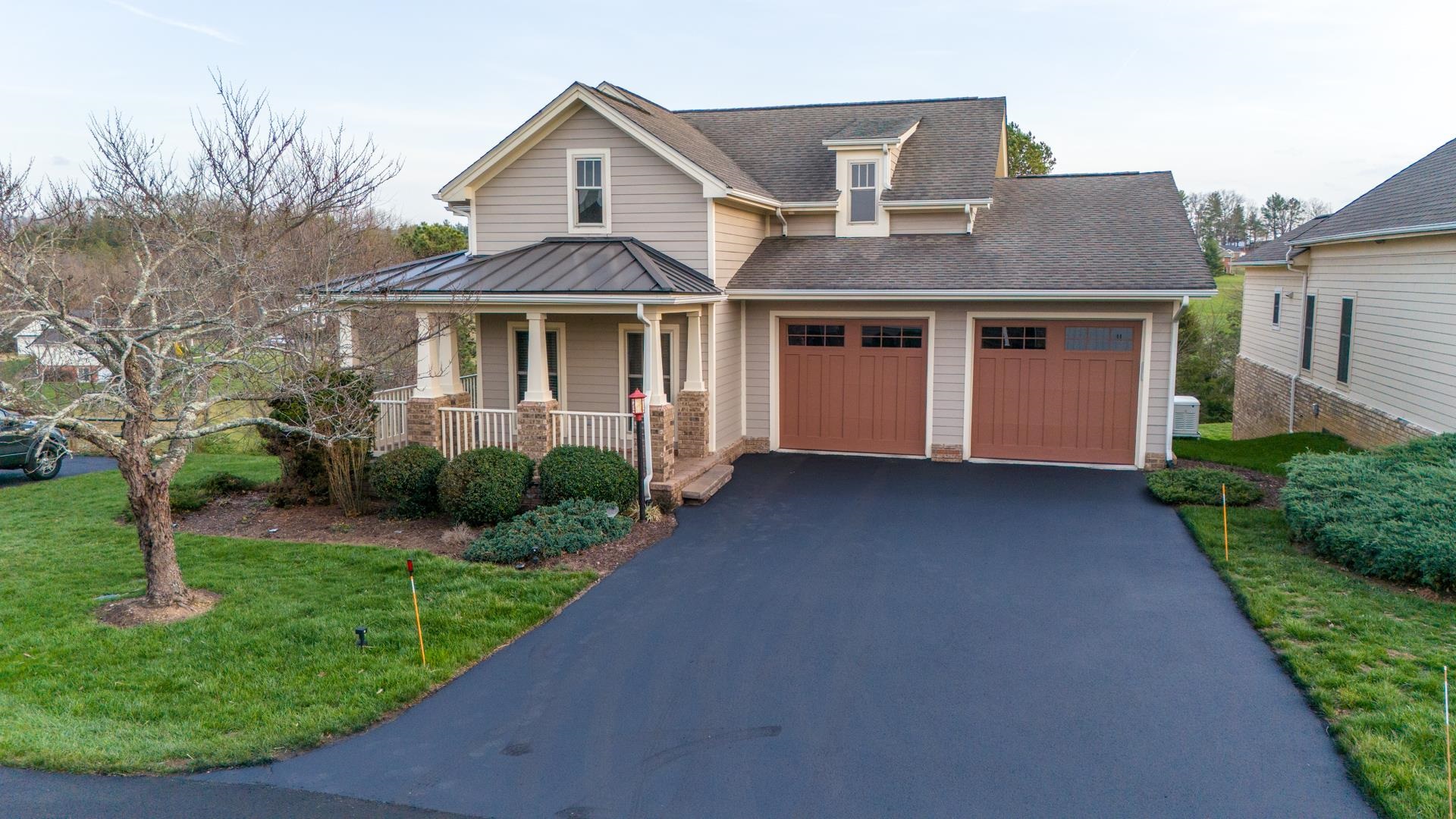 Welcome to 3837 Fairway View Drive, a beautiful Craftsman-style home located in Auburn Hills golf course community. This spacious residence features four bedrooms and four full bathrooms. The main level boasts 9-foot ceiling and beautiful hardwood floors throughout. Enjoy a large living room with a cozy gas fireplace, perfect for relaxing or entertaining. The well-appointed kitchen features granite countertops, stainless steel appliances, and a gas range, plus a dedicated dining room ideal for gatherings. The main level also includes a large primary bedroom with a vaulted ceiling, creating an open and airy retreat, along with a private en-suite bathroom and sauna. An additional bedroom and full bath are located on the main level  Step outside to the covered porch where you can take in scenic views of the golf course and pond. The lower level offer two bedroom and two full bathroom plus a family room with a gas fireplace, private office and versatile room for a media, gym or playroom