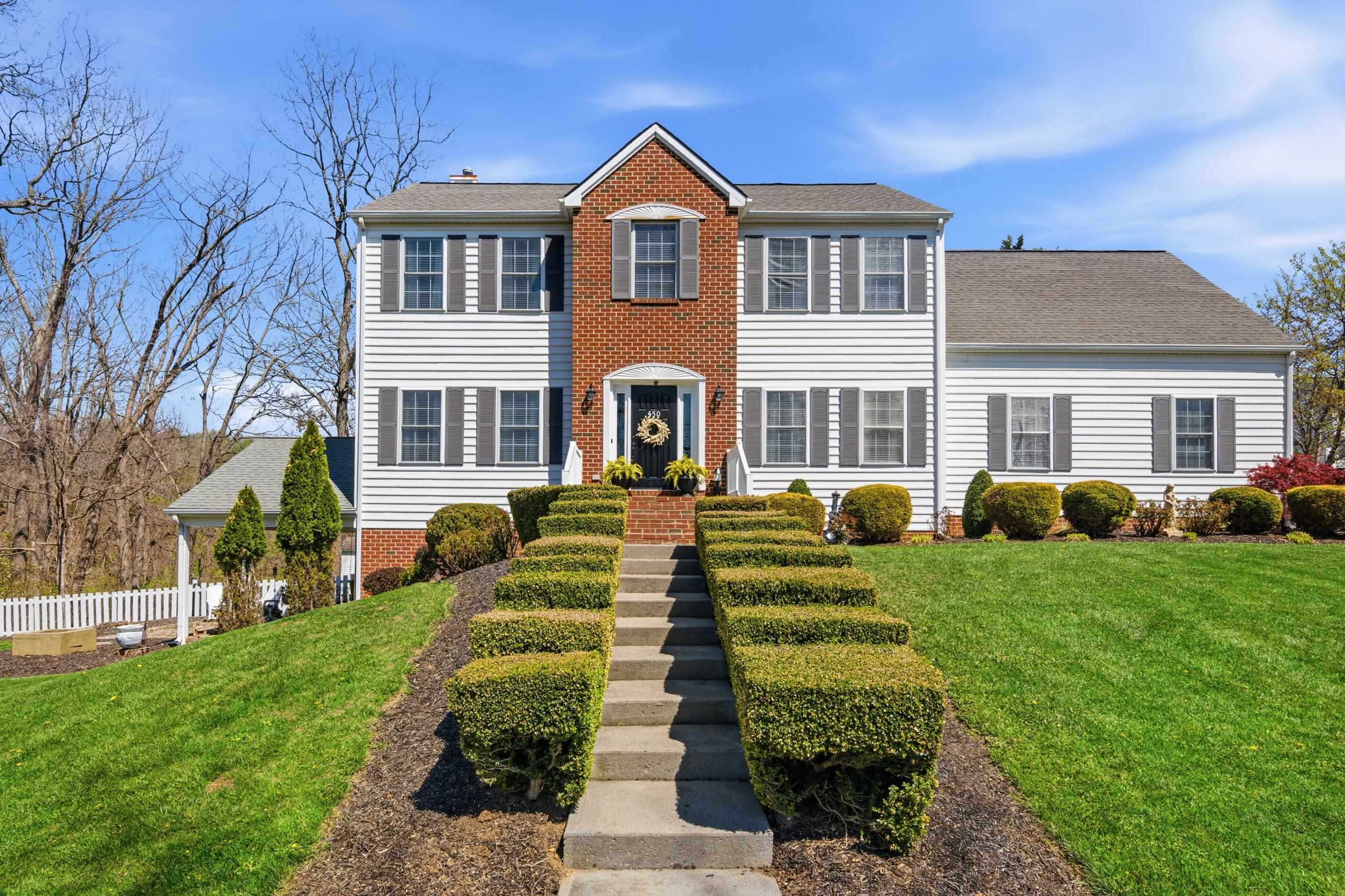 Welcome to 450 Tower Road! Where timeless colonial charm meets show stopping upgrades and space to truly live. This stunning home delivers a sprawling primary suite retreat with a beautifully appointed bath and private office, while four additional bedrooms upstairs offer room for everyone. The finished basement adds even more versatility with an extra bedroom, living room and bathroom for guests or multigenerational living. Step outside and fall in love with lush landscaping, expansive decking for entertaining, a fenced yard with open green space and a lower-level patio complete with a fountain and seating ready for years of making unforgettable memories. Tucked in a prime Christiansburg location and a stone's throw to I-81, shopping and dining, this is the kind of home you wait for and rarely find. Schedule your showing today!