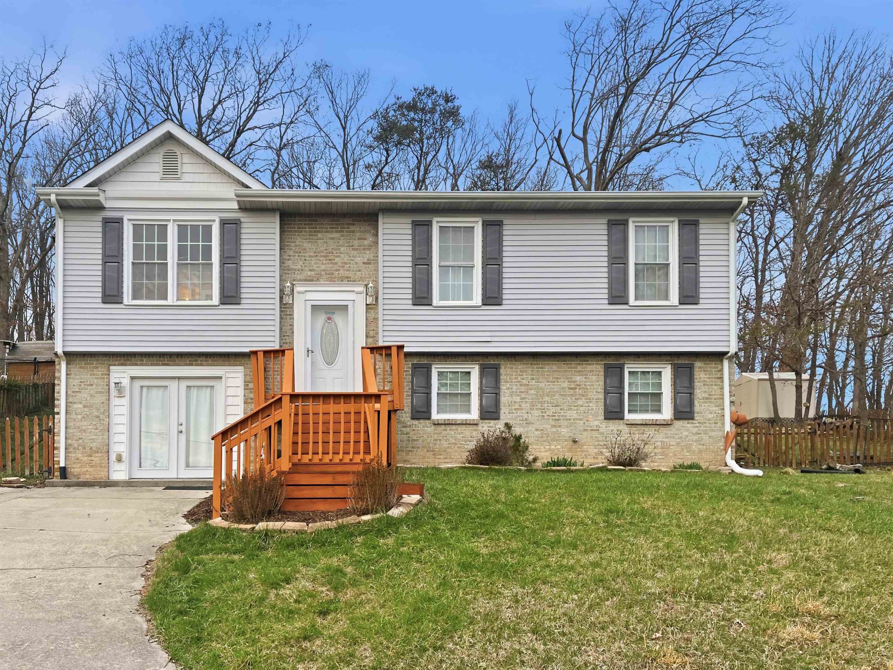 Well-maintained home with stunning views and thoughtful upgrades throughout! 4 bedroom 3 full baths, Enjoy a fenced backyard complete with a shed—perfect for storage, pets, or outdoor living. Durable tile flooring offers long-term use and easy cleanup. The versatile lower-level bedroom can also serve as a cozy den, featuring a wood stove for added warmth and charm.  Bonus room in basement can be office, game room, mudroom, or another living area. Major updates include HVAC replacement in 2023, in 2021 they updated the kitchen with new appliances, flooring, light fixtures and pull cabinet, in 2022 they replaced deck boards -making this home move-in ready and a must-see!