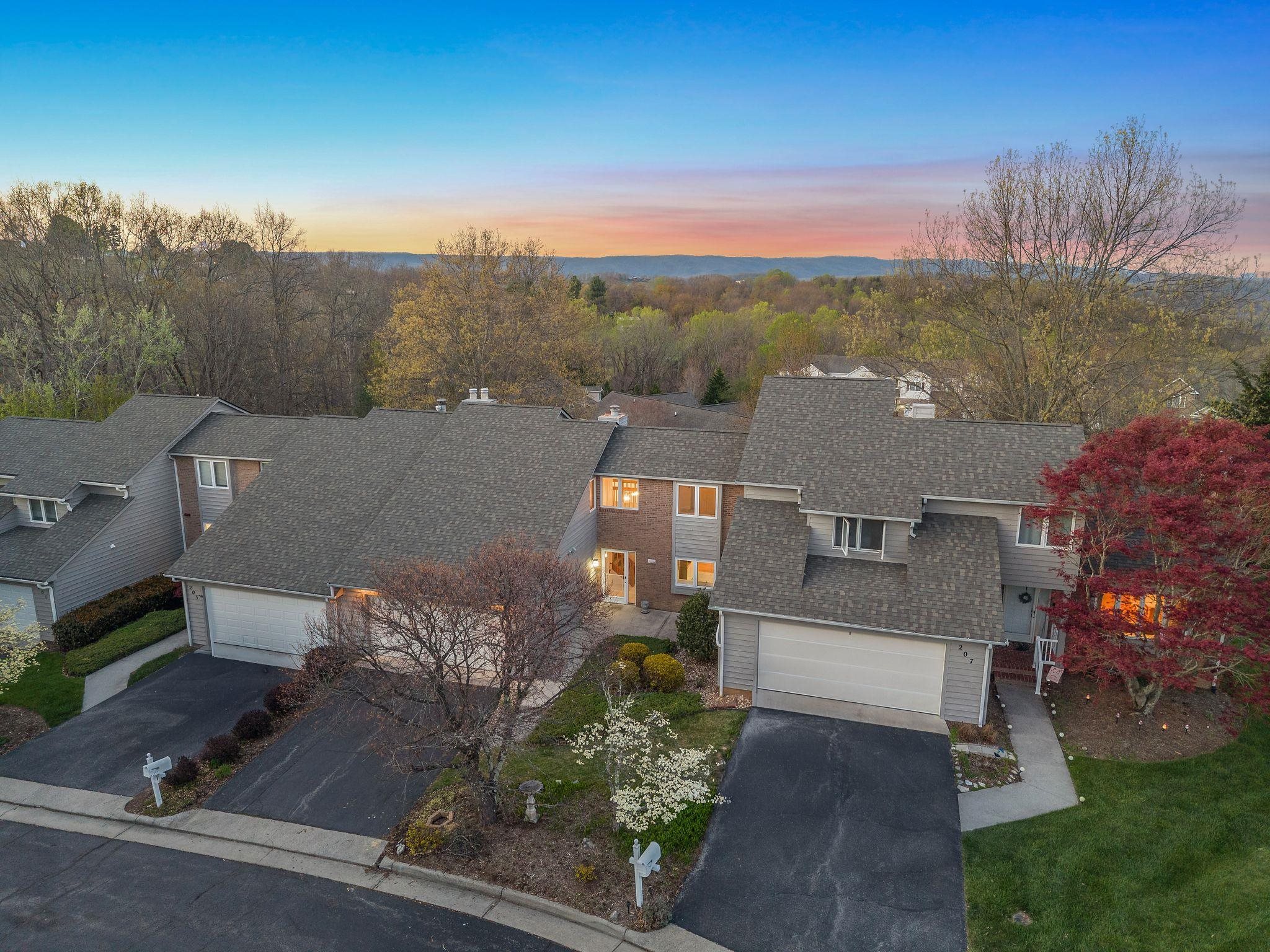 Welcome to 205 Woods Edge Ct! This 3 BR/3.5 BA townhouse offers low-maintenance living with HOA-covered exterior maintenance and yard care. Located just 1.3 miles to downtown Blacksburg and 1.5 miles to Virginia Tech campus, convenience meets comfort. The main-level primary suite features mountain views, with laundry also on the main level for easy one-level living. Enjoy an open-concept kitchen, dining, and living area that leads to a spacious deck with scenic views. Upstairs offers two bedrooms and a full bath. The finished basement includes a full bath and potential 4th (non-conforming) bedroom, and access to the back patio. Just outside town limits means county taxes only, with public water/sewer and Blacksburg schools. Ideal for full time resident owners, investors, or VT Football game day weekends. Vacant and easy to show—schedule today!  Pre-listing Home Inspection is available on request.