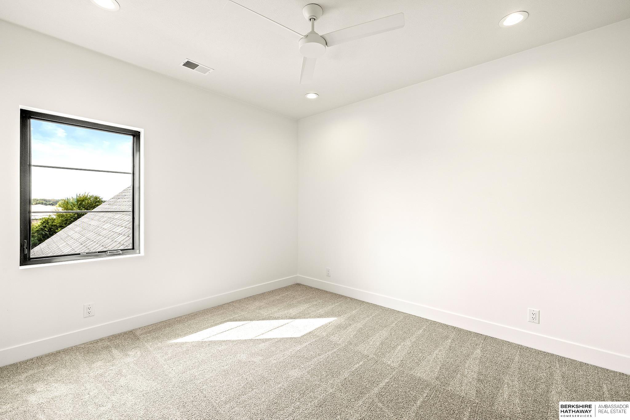 2214 S Riverwood Drive, Fremont, NE 68025 — MLS #22527613 — photo 32 of 73