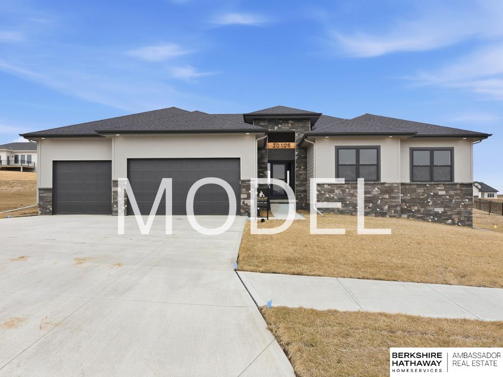 Model Home Not for Sale. Discover the Montgomery Ranch by Nelson Builders - a perfect blend of comfort, function, and modern style. This thoughtfully designed home features three spacious bedrooms on the main floor, offering plenty of room to relax. Need more space? The lower level provides the option to add two additional bedrooms for ultimate flexibility. At the heart of the home, the expansive kitchen shines with a large, flush island ideal for meal prep or casual dining, plus a walk-in pantry for effortless organization. A main-floor laundry room and drop zone off the garage keep daily life simple and tidy. The tucked-away staircase enhances flow and maximizes the open feel of the lower level. With its seamless layout, smart design, and room to grow, the Montgomery balances style, comfort, and livability - crafted for modern living at its finest.