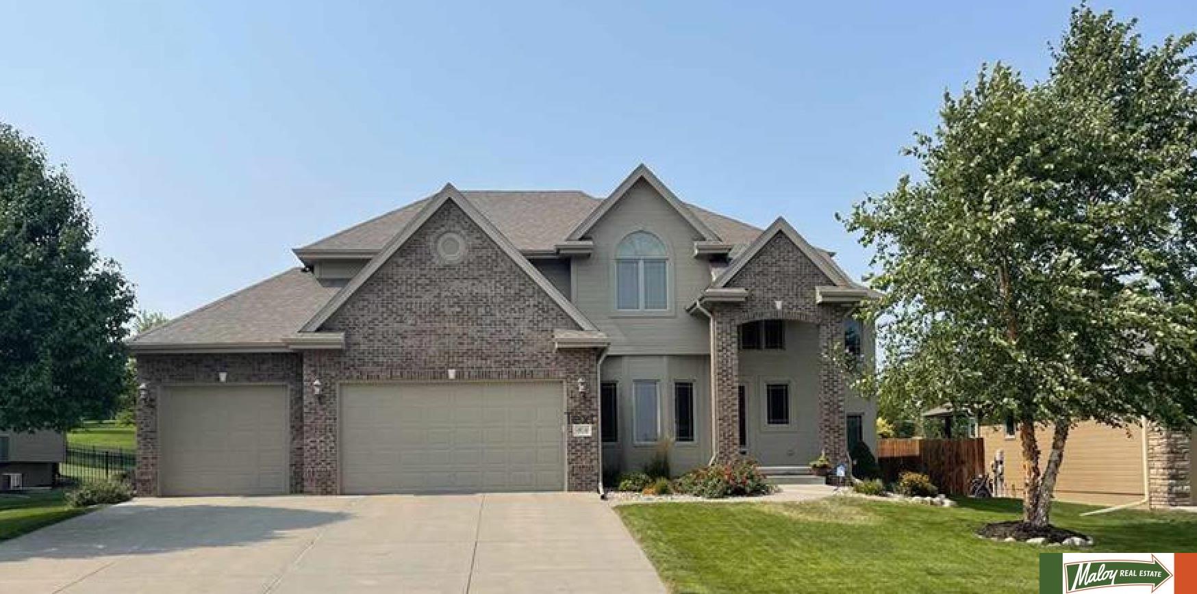 ASSUMABLE VA Loan @ 2.375%. Beautiful 2 Story, 4 bedroom/6 bathroom/3 car garage home in popular Whitehawk Lake neighborhood, located just across the street for Whitehawk Lake. You'll be wowed with the open floor plan with 9 ft ceilings and new lvp flooring throughout main floor. If you love a big kitchen island you won't want to miss this one. Beautiful remodeled kitchen with huge island that includes a beverage center. Kitchen has walk-in pantry, gorgeous custom cabinets, double ovens and 3-sided fireplace. Lovely Master bedroom with large walk-in closet, en-suite with whirlpool tub, huge shower and double sinks. 2 bedrooms have Jack-n-Jill bathroom and the 4th bedroom has it's own private bathroom. The finished basement is an entertainers dream, large open area and perfectly placed bar to maximize this wonderful rec room. Entertaining doesn't stop inside, this home has a wonderful lansdscaped yard, with covered patio that is wired for a hot tub AND a Newer Roof & HVAC. AMA