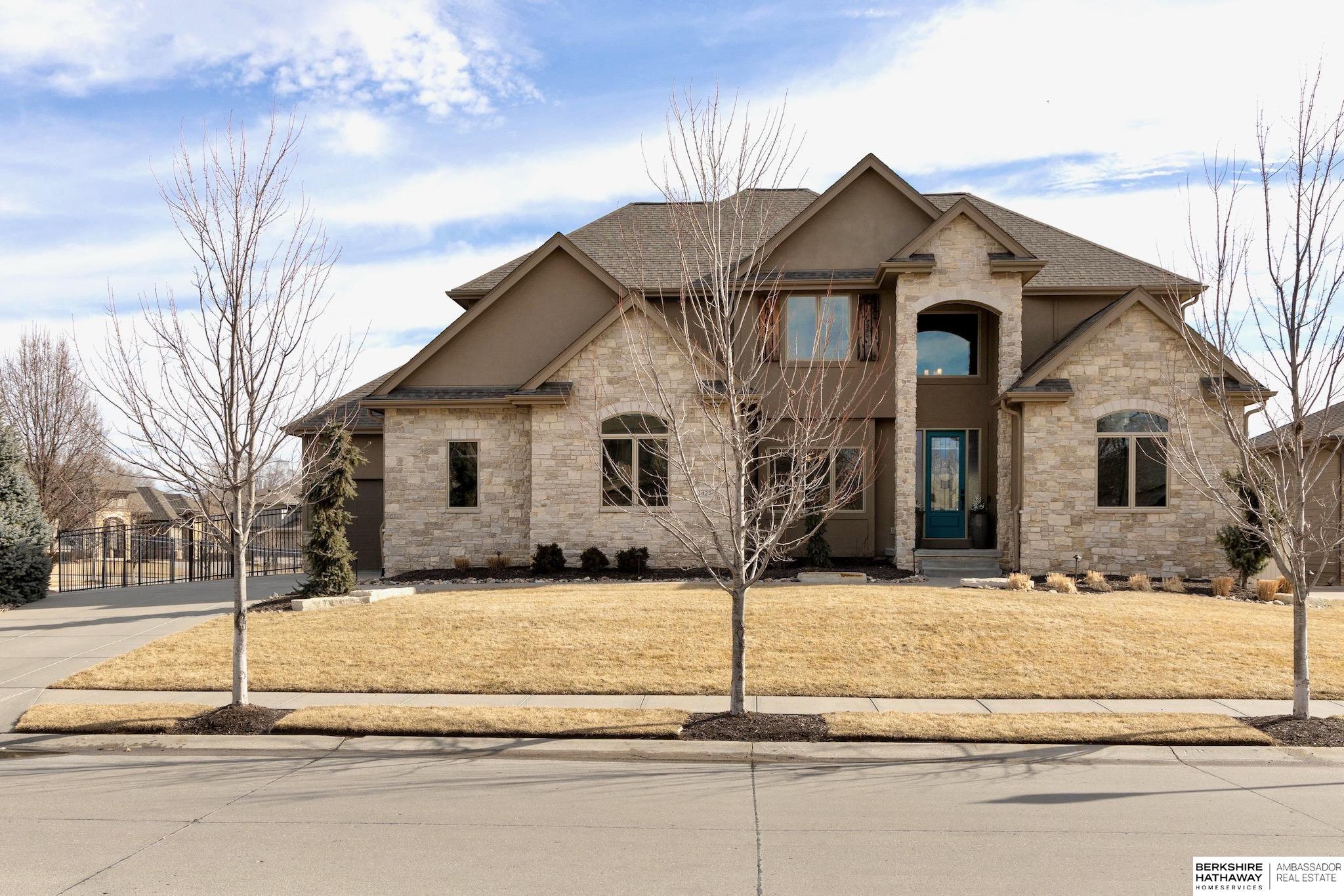 Enter into the stunning foyer of this Silverleaf Estates 2 story, and you will be greeted with a gorgeous curved staircase. This home is set up perfectly to entertain inside and out. There is plenty of space for everyone in both the formal dining room and kitchen eating areas. The walk through pantry boasts plenty of storage. Continue your entertaining outside on the covered maintenance free deck or in the newly transformed backyard. There is an outdoor kitchen with Blaze appliances, beautiful stone patio with gas firepit area and relaxing bubbling fountain. This home sits on a large, fully fenced corner lot. The furnace and AC are new in 2024. There is also a newly remodeled basement with LVP floors and striking pre-lit built-ins showcasing an electric fireplace. New interior paint runs throughout the home. There are 4 bedrooms upstairs all with bathroom access. The primary en-suite has 2 walk-in closets for all of your storage needs. This home has so much to offer!