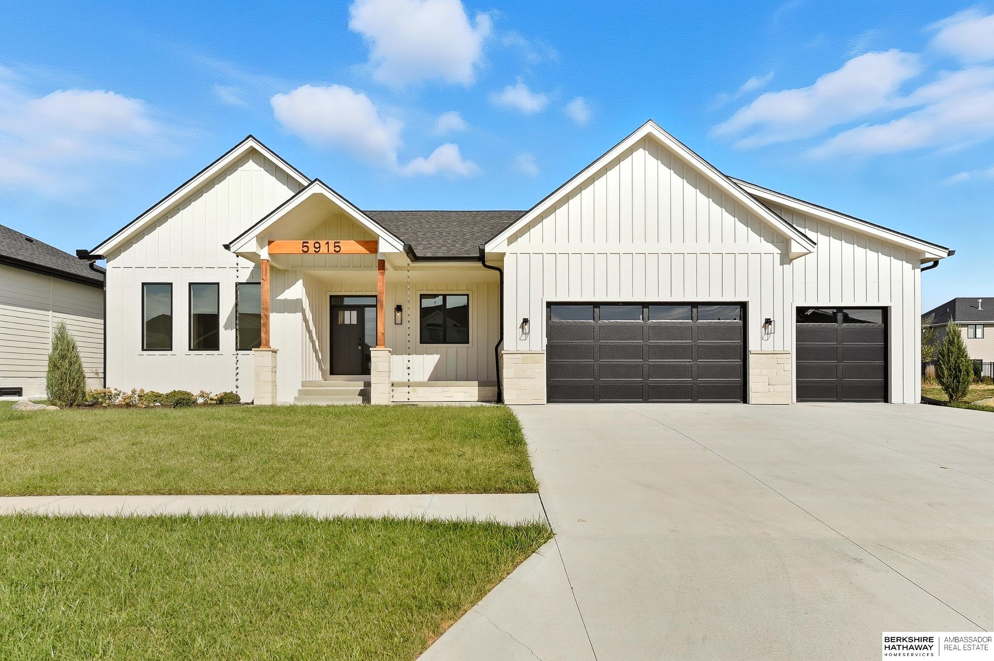 2025 Parade of Homes by Willow Custom Homes. This beautifully designed & quality-built home offers an exceptional blend of luxury, comfort & functionality. Featuring a dream kitchen which is a chef's delight, showcasing a gorgeous center island, a gas range, an eat-in dining space & a spacious walk-in pantry with ample prep counter space. The great room is designed for seamless indoor-outdoor living, with Pella double sliding doors that open to a covered patio, perfect for entertaining. The designer primary suite is a true retreat, featuring a stylish accent wall, a spa-like bathroom with a zero-entry shower, a freestanding soaker tub, plus a walk-in closet w/ a center island  & direct access to the laundry room. The finished lower level provides additional living space, complete w/ a wet bar, a wide-open recreation area, & two additional bedrooms. Situated on a flat lot, this home offers the perfect combination of sophistication and practicality. Don't miss this opportunity.