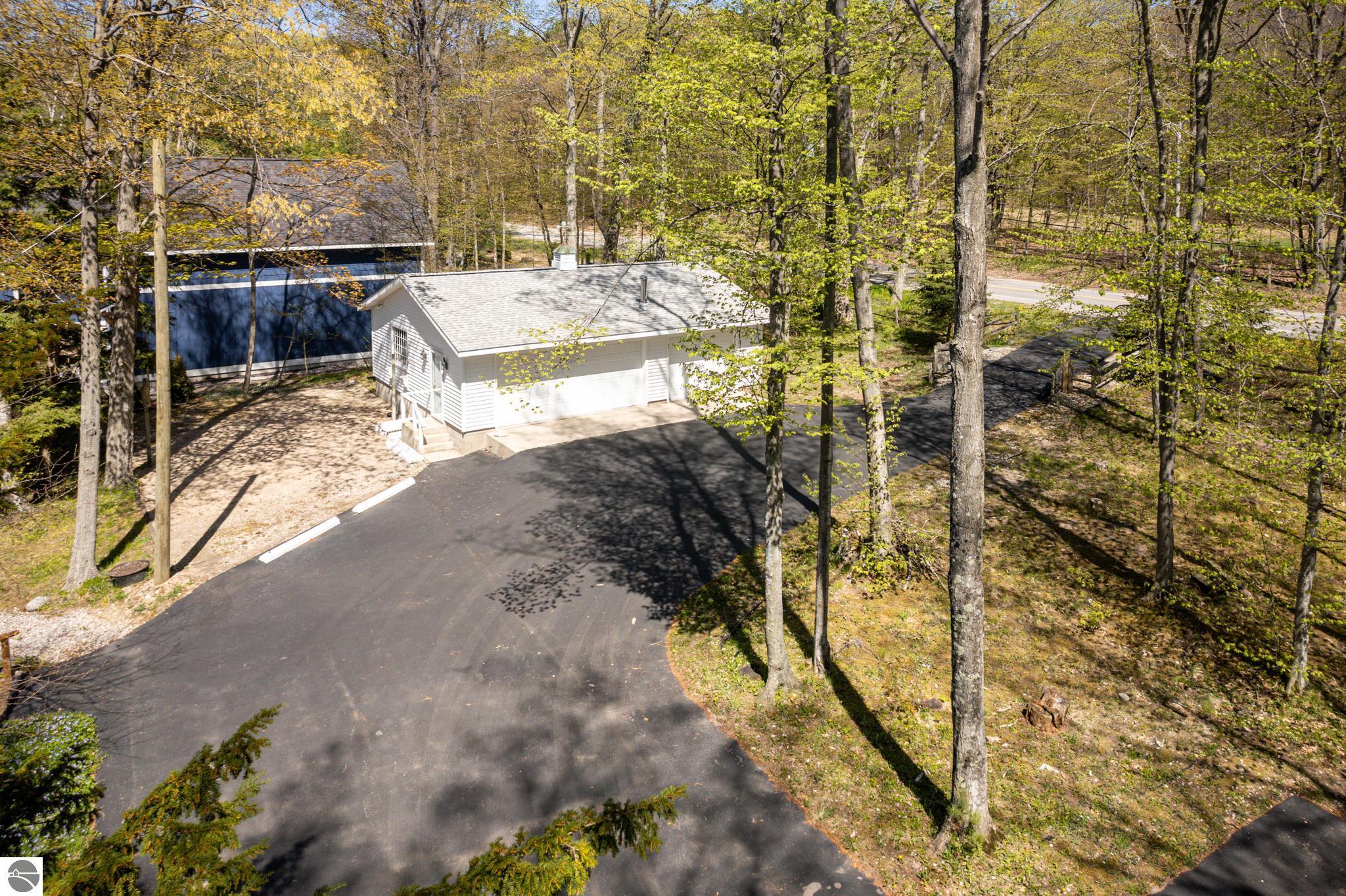 8432 S Dunns Farm Road, Maple City, MI 49664 — Photo 36