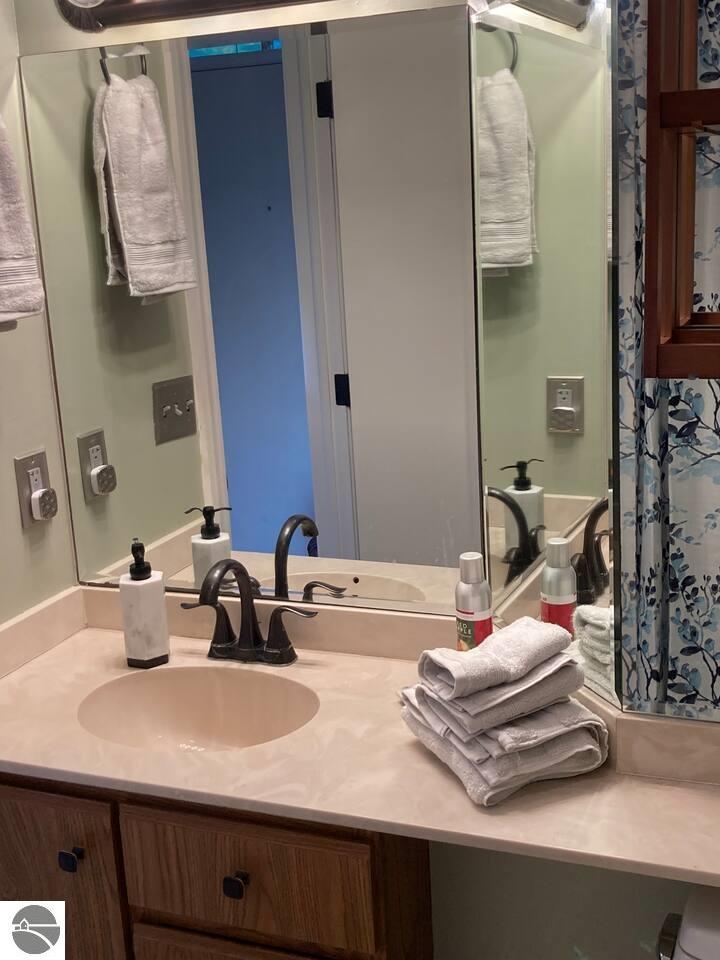 5605 E Creeks Crossing, Williamsburg, MI 49690 — Photo 12