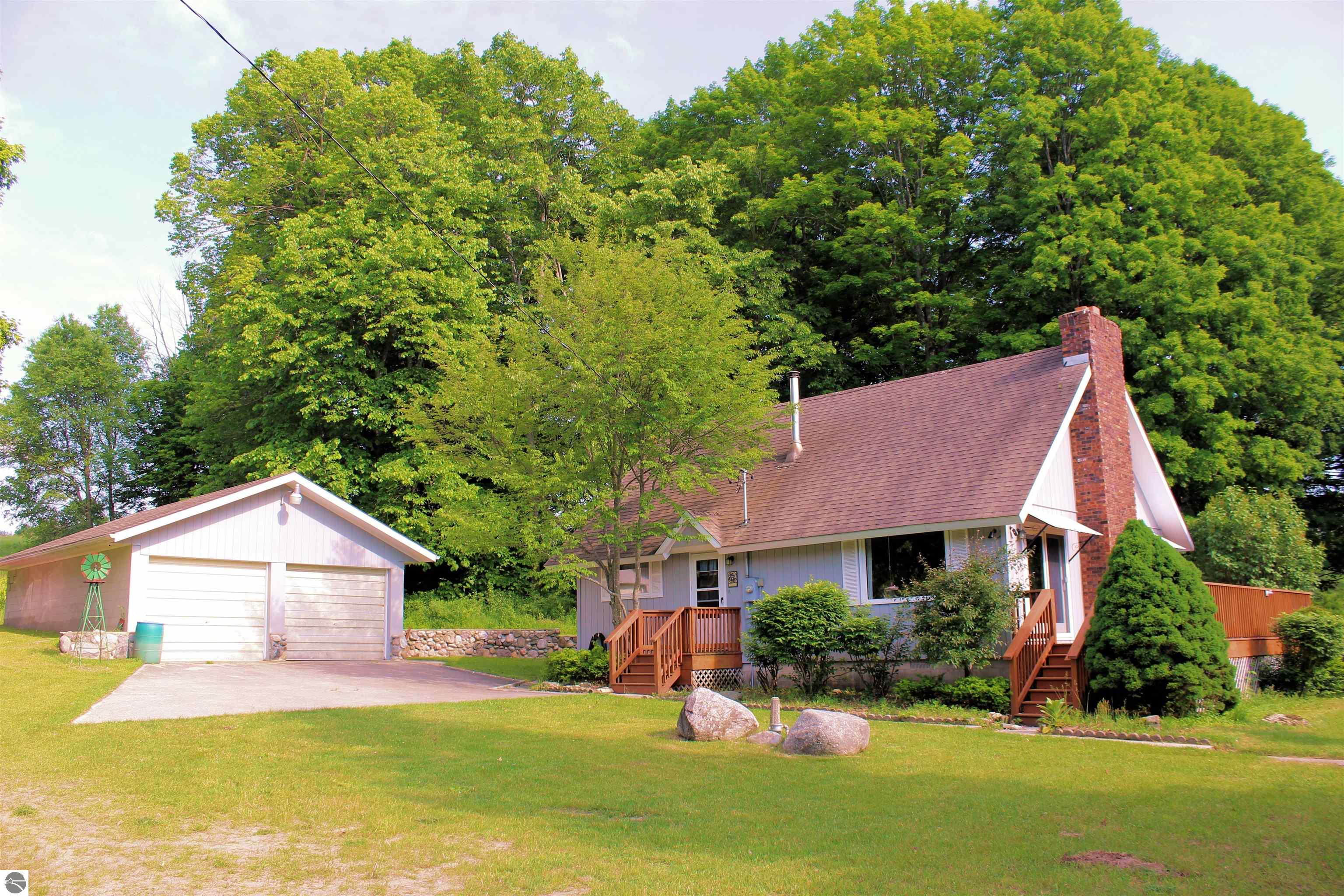 7203 Valley, Honor, MI 49640 — front exterior