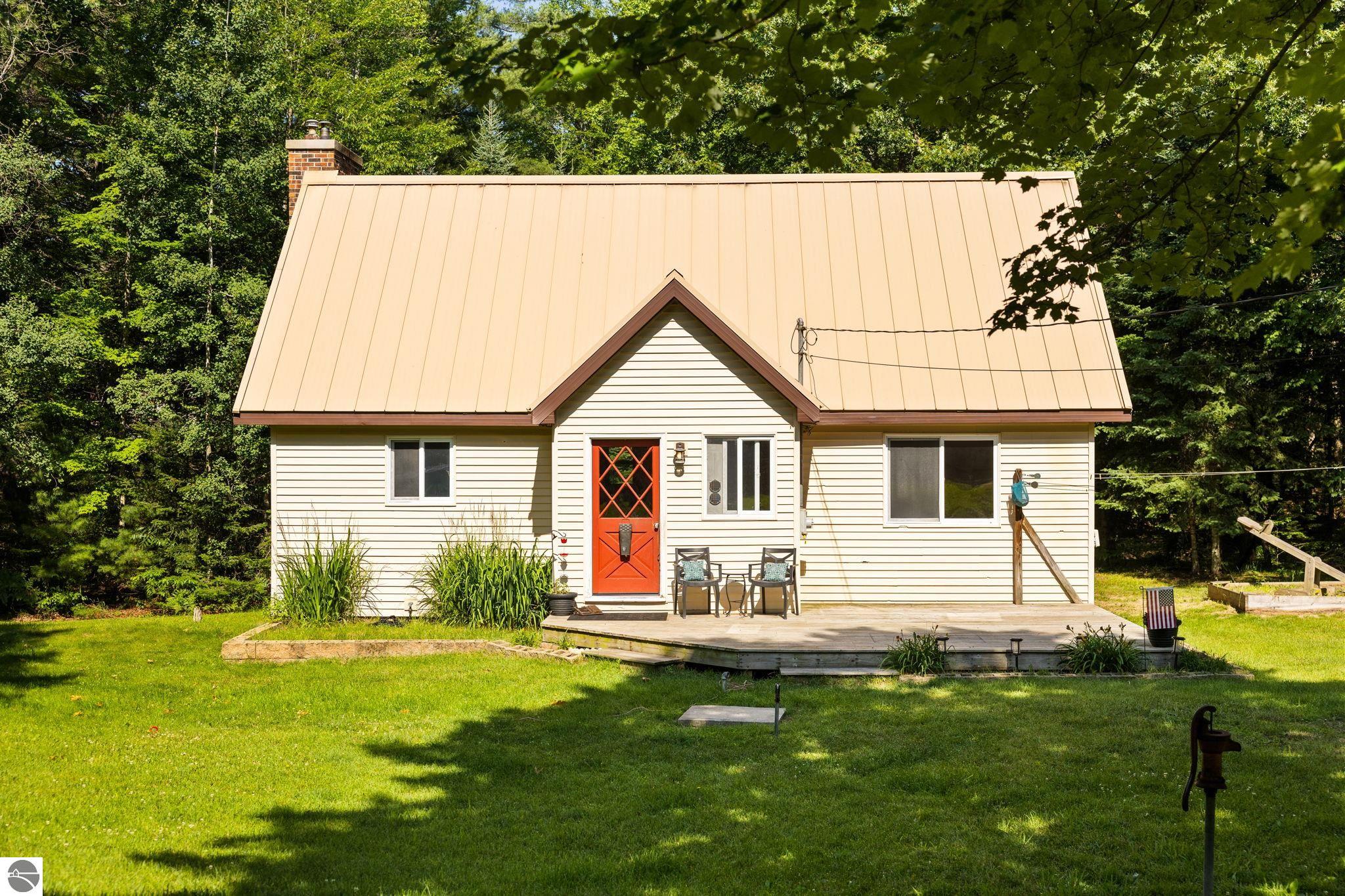 11625 East Drive, Fife Lake, MI 49633 — front exterior