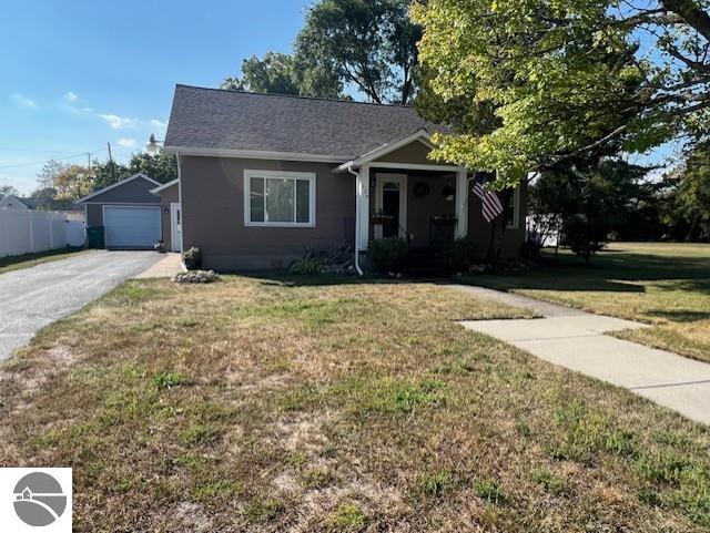 224 Fourth Avenue, Tawas City, MI 48763 — front exterior