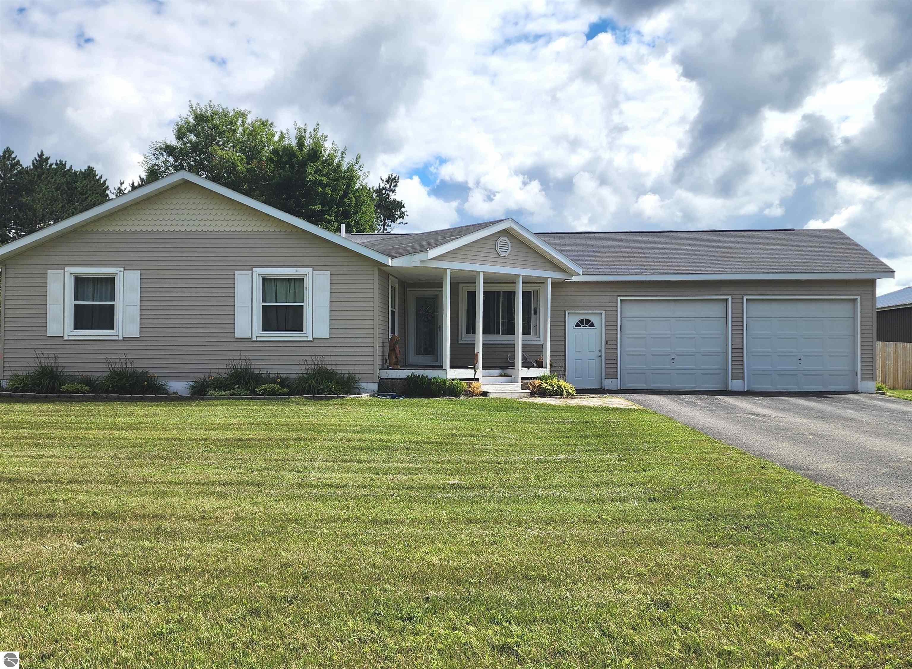 7569 Cedar River Road, Mancelona, MI 49659 — front exterior
