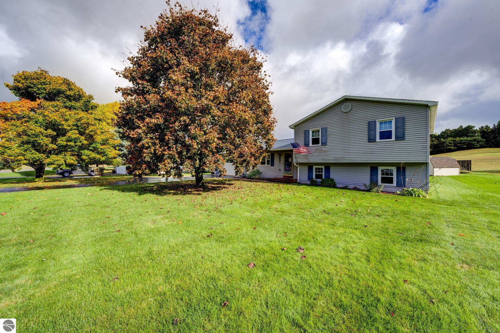 12199 S Lincoln Hollow, Cedar, MI 49621 — front exterior