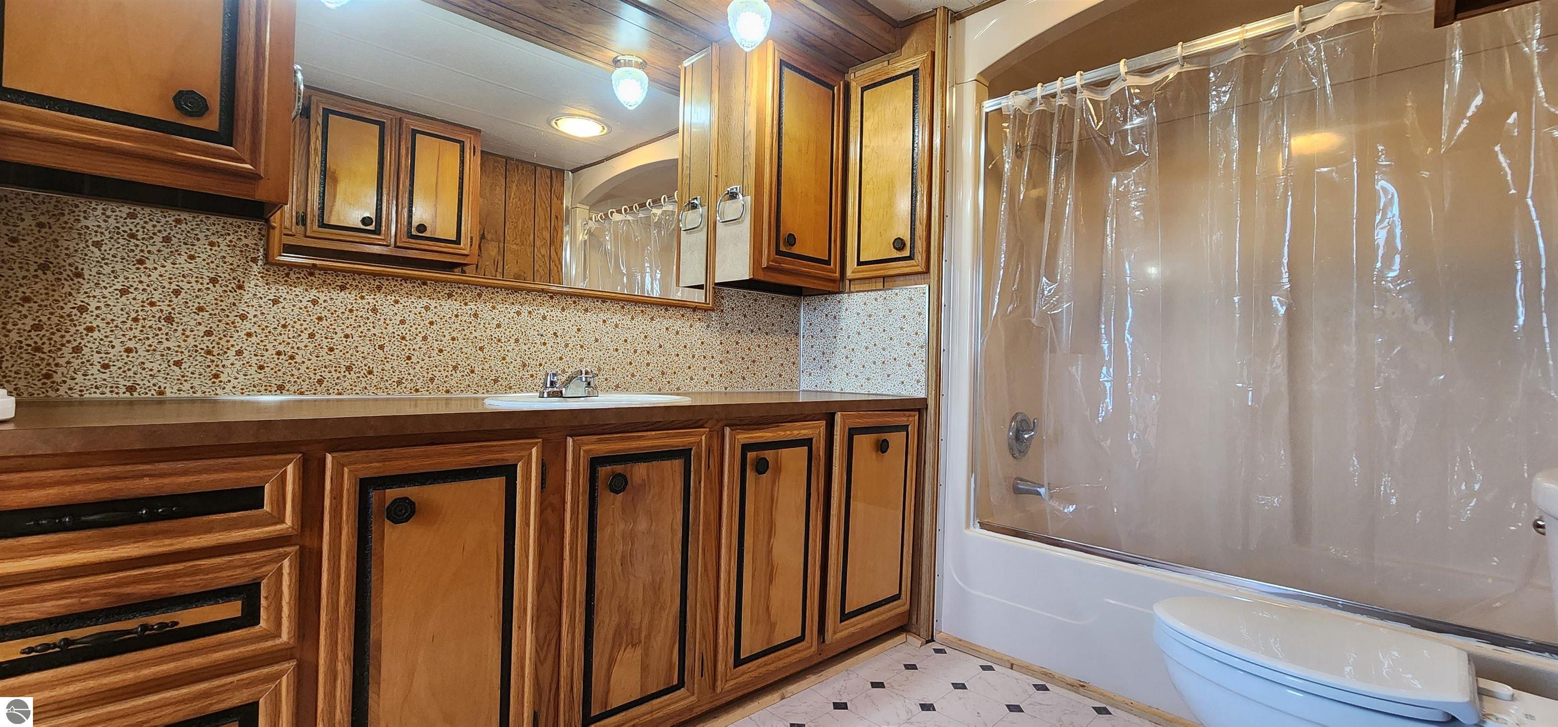 8838 N Deyoung Road, Lake City, MI 49651 — Photo 21
