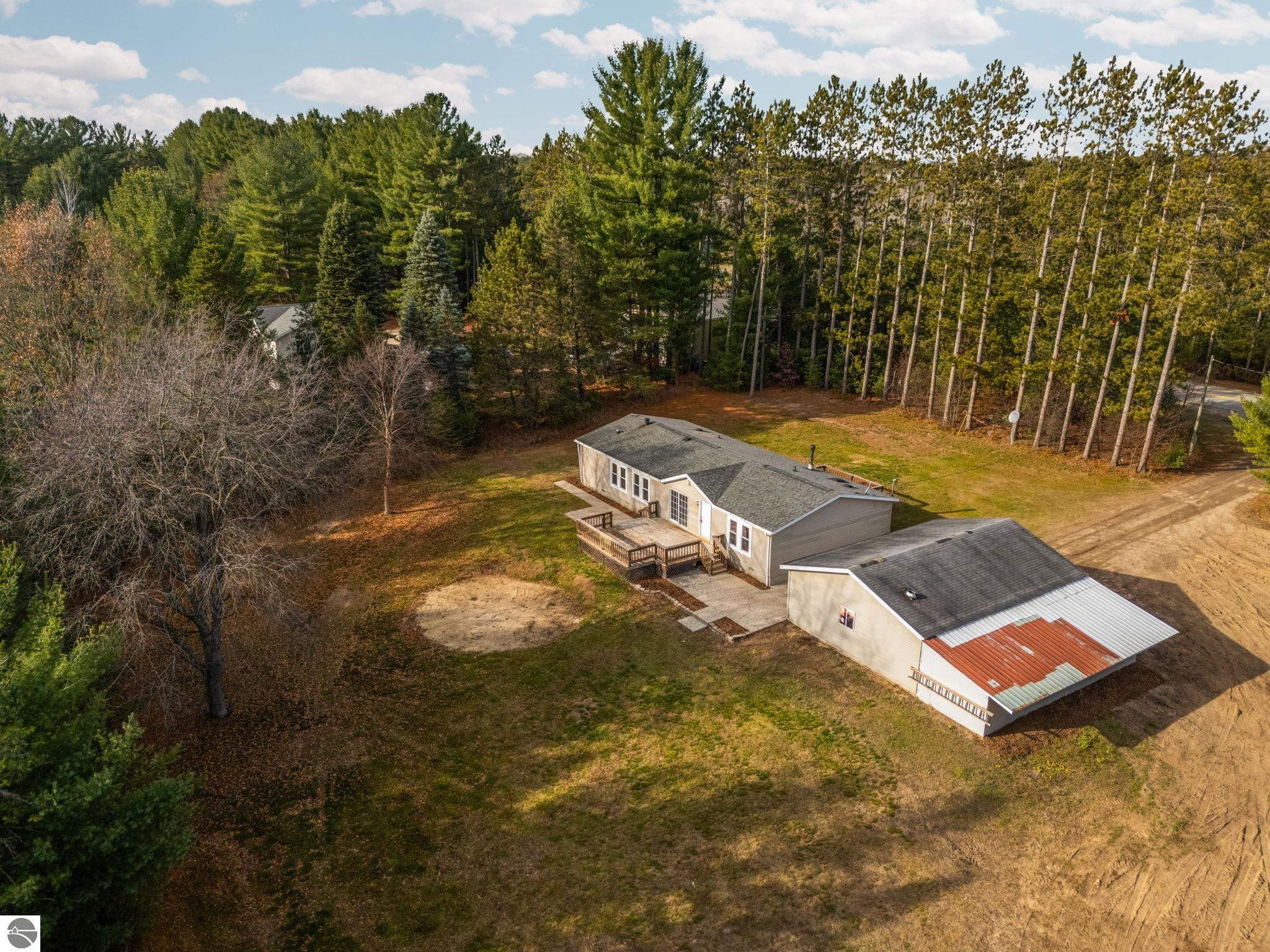 5765 Lund Road SW, Fife Lake, MI 49633 — front exterior