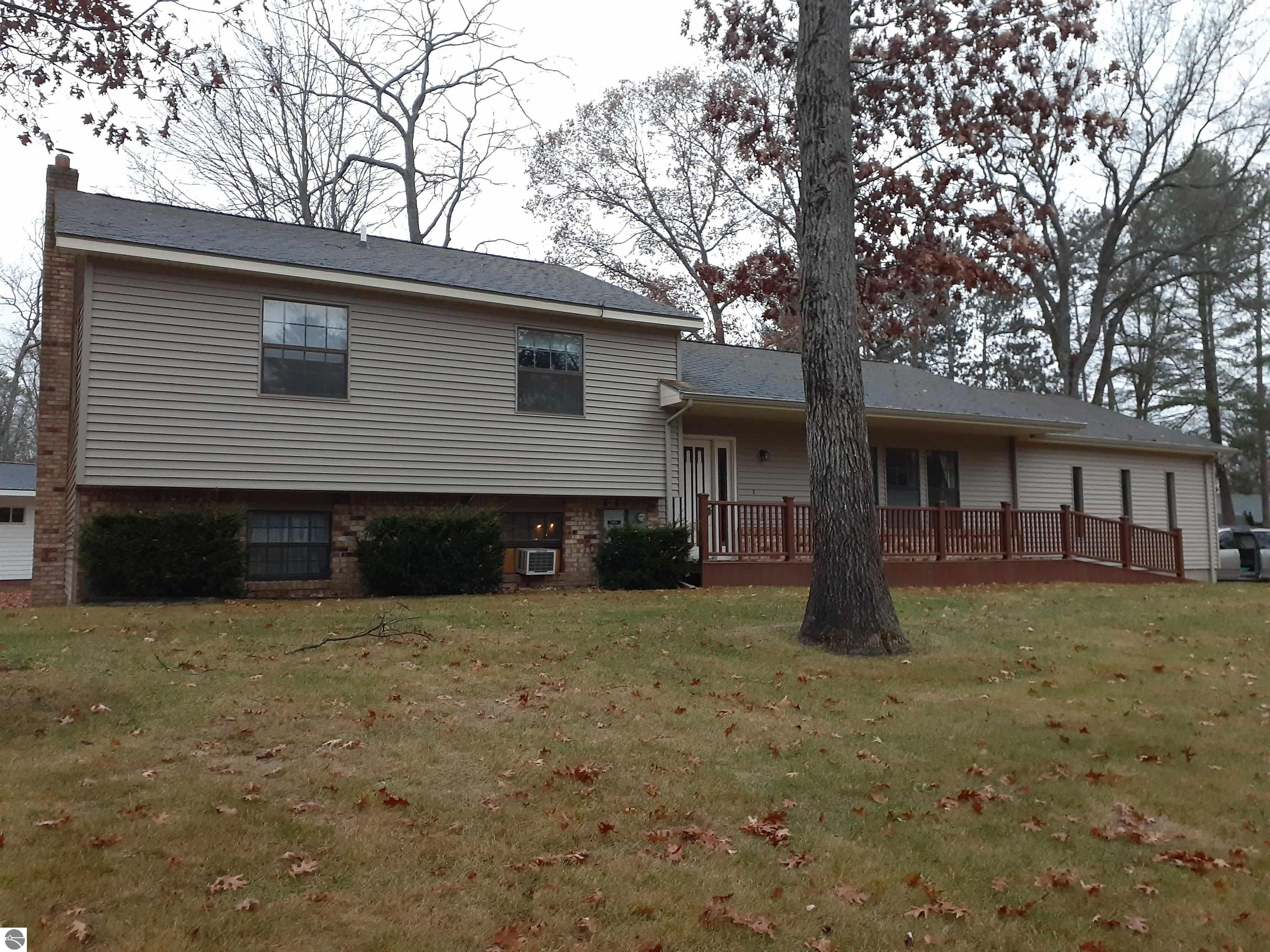 6960 Knollwood Court, Oscoda, MI 48750 — front exterior
