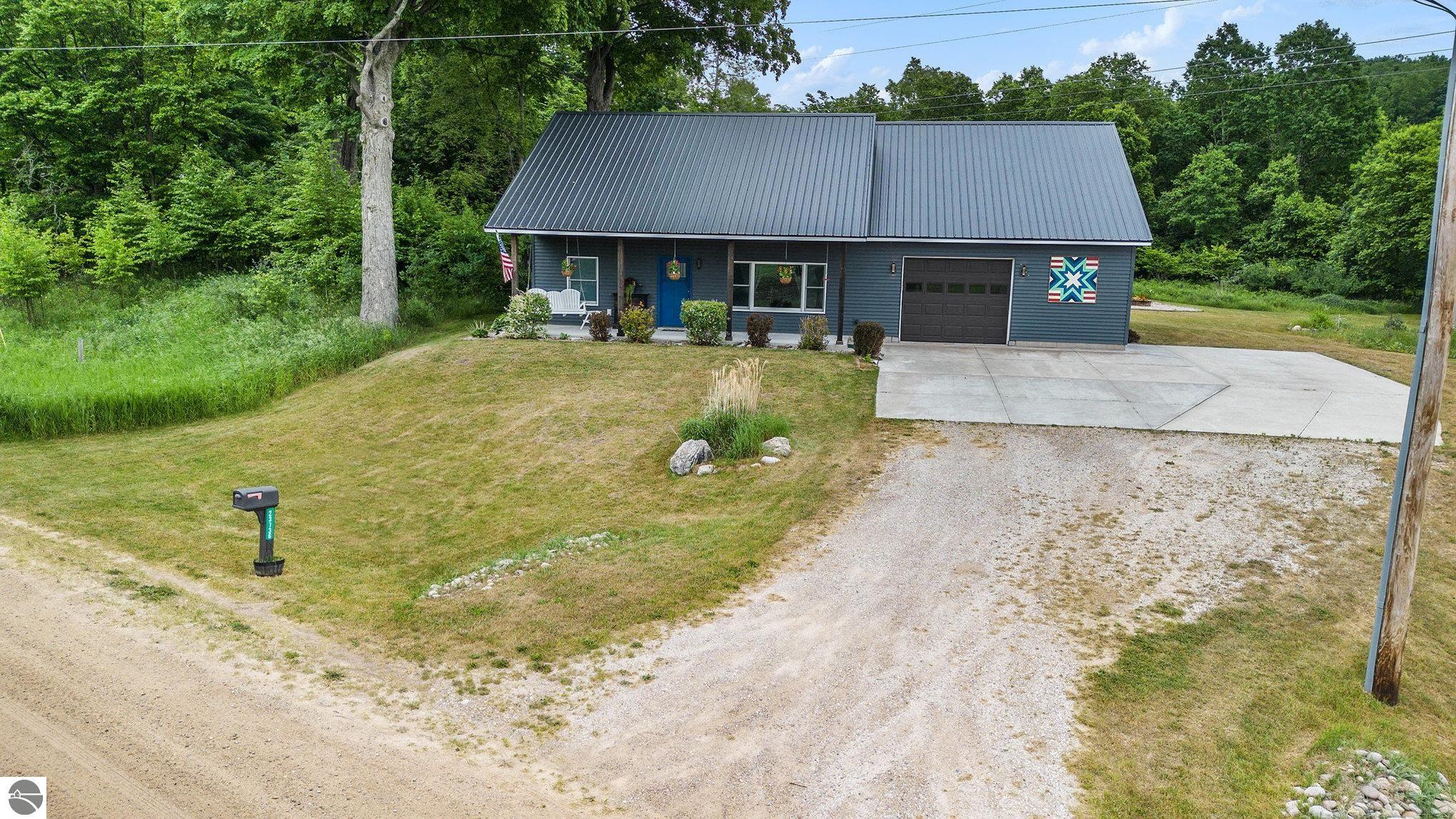 23736 110th Avenue, Tustin, MI 49688 — front exterior