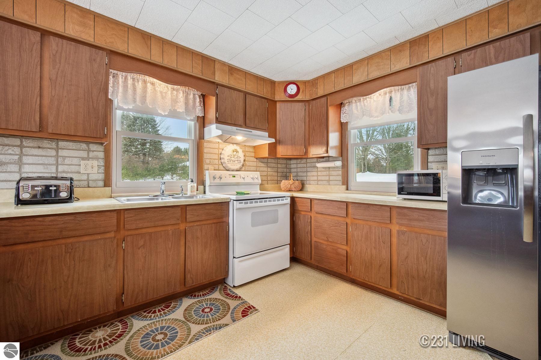 11888 Hickin Road, Rapid City, MI 49676 — Photo 10