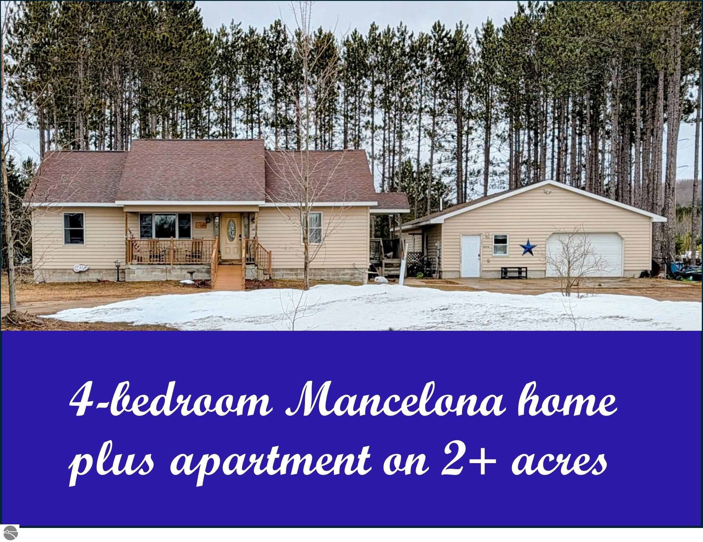 2095 Musser, Mancelona, MI 49659 — front exterior