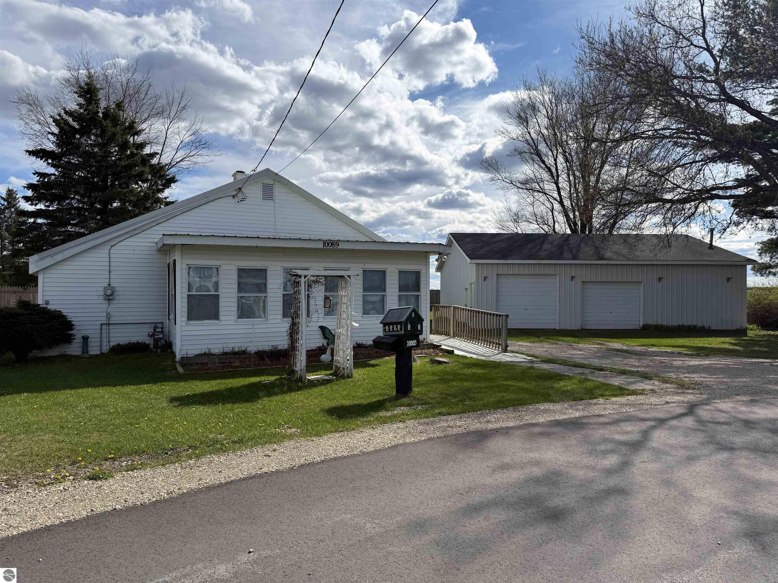10089 Otis Drive, Mancelona, MI 49659 — front exterior