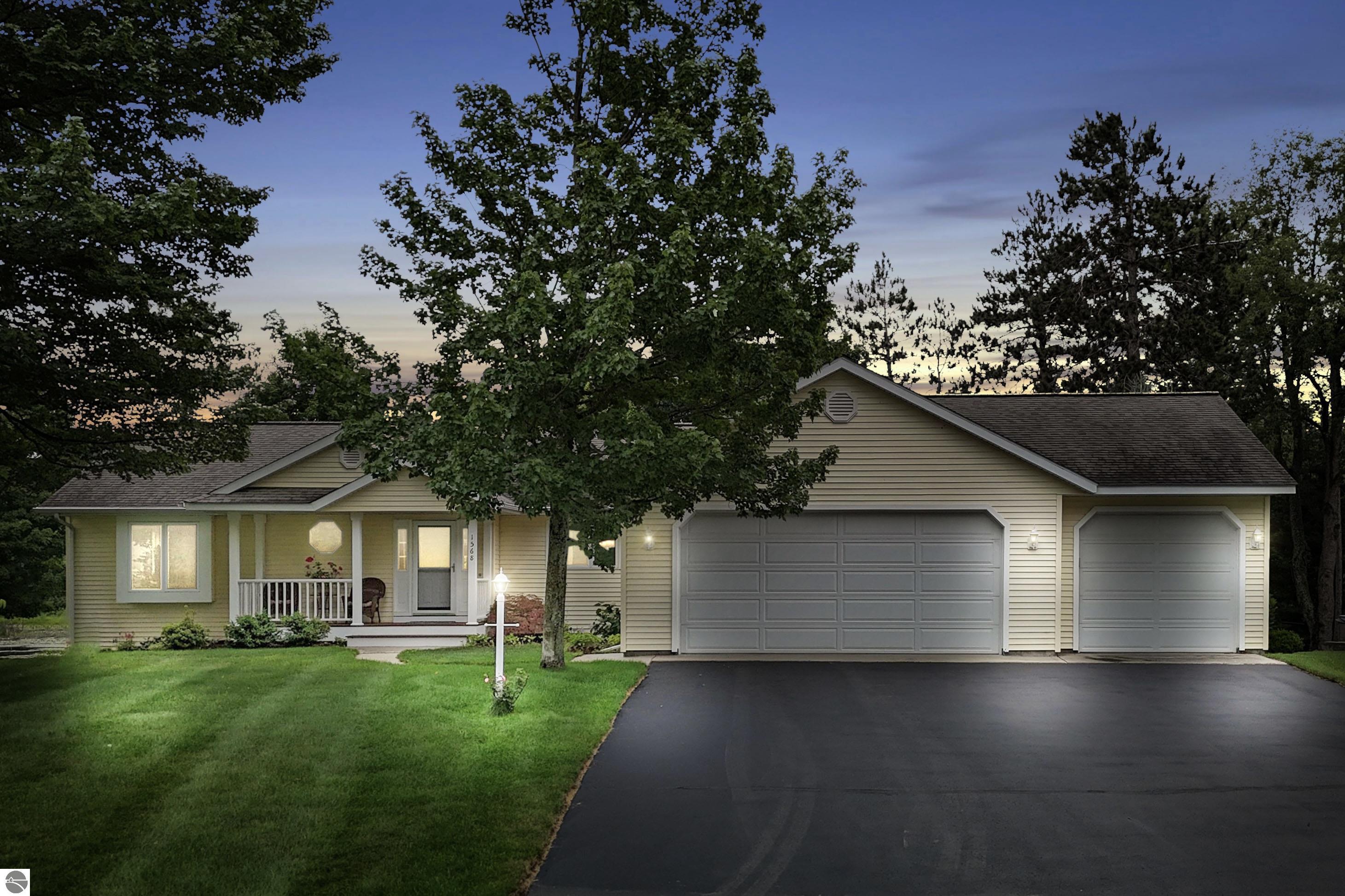1568 Nightingale Lane, Kingsley, MI 49649 — front exterior