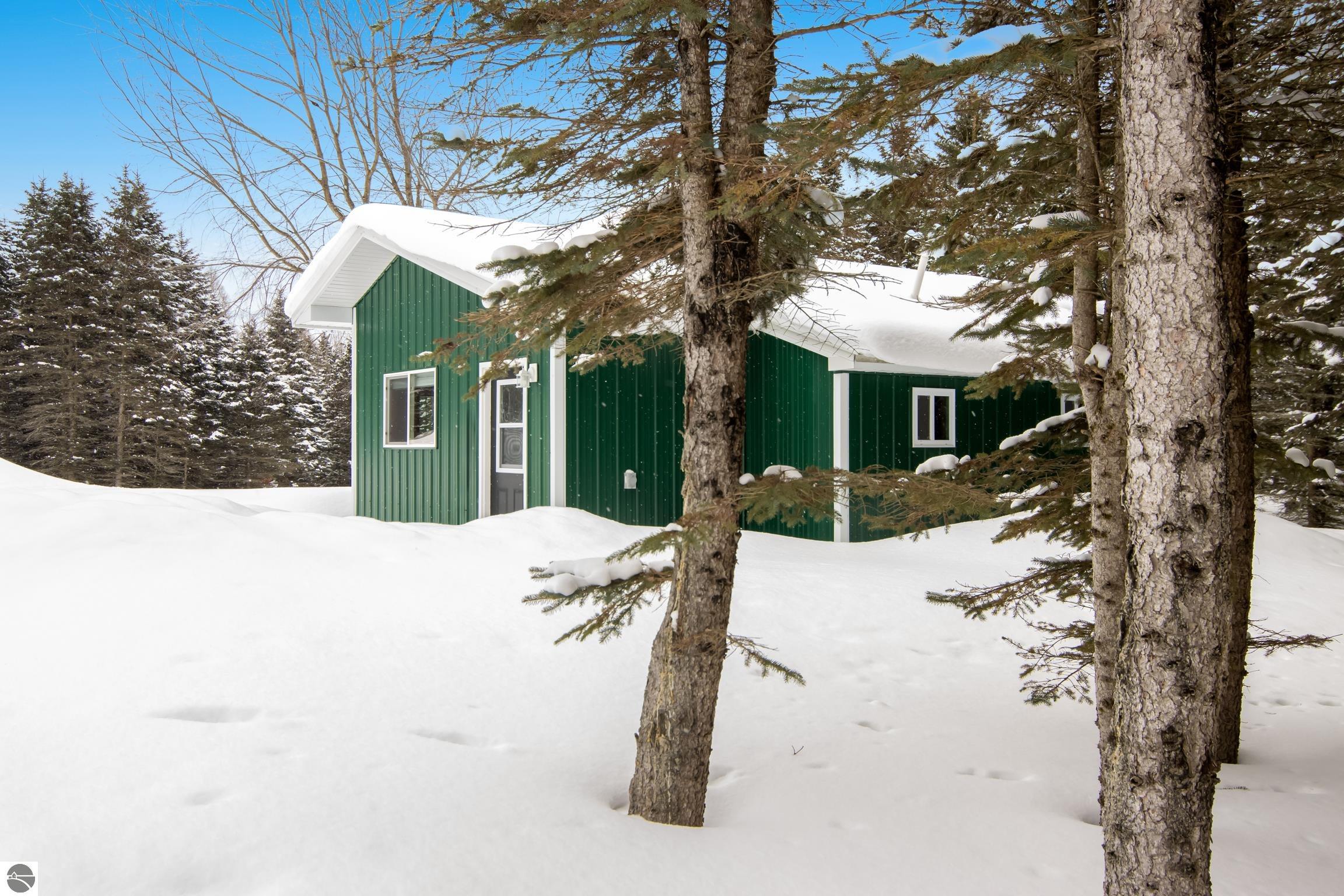 9775 SW Creighton Road, Fife Lake, MI 49633 — front exterior