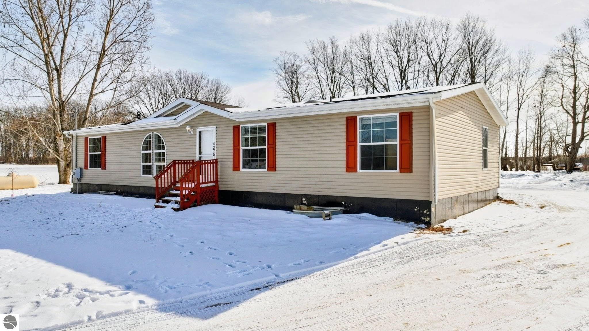 4375 W Millbrook Road, MI 48858 — front exterior