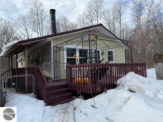 18575 Royena Drive, Marion, MI 49665 — front exterior