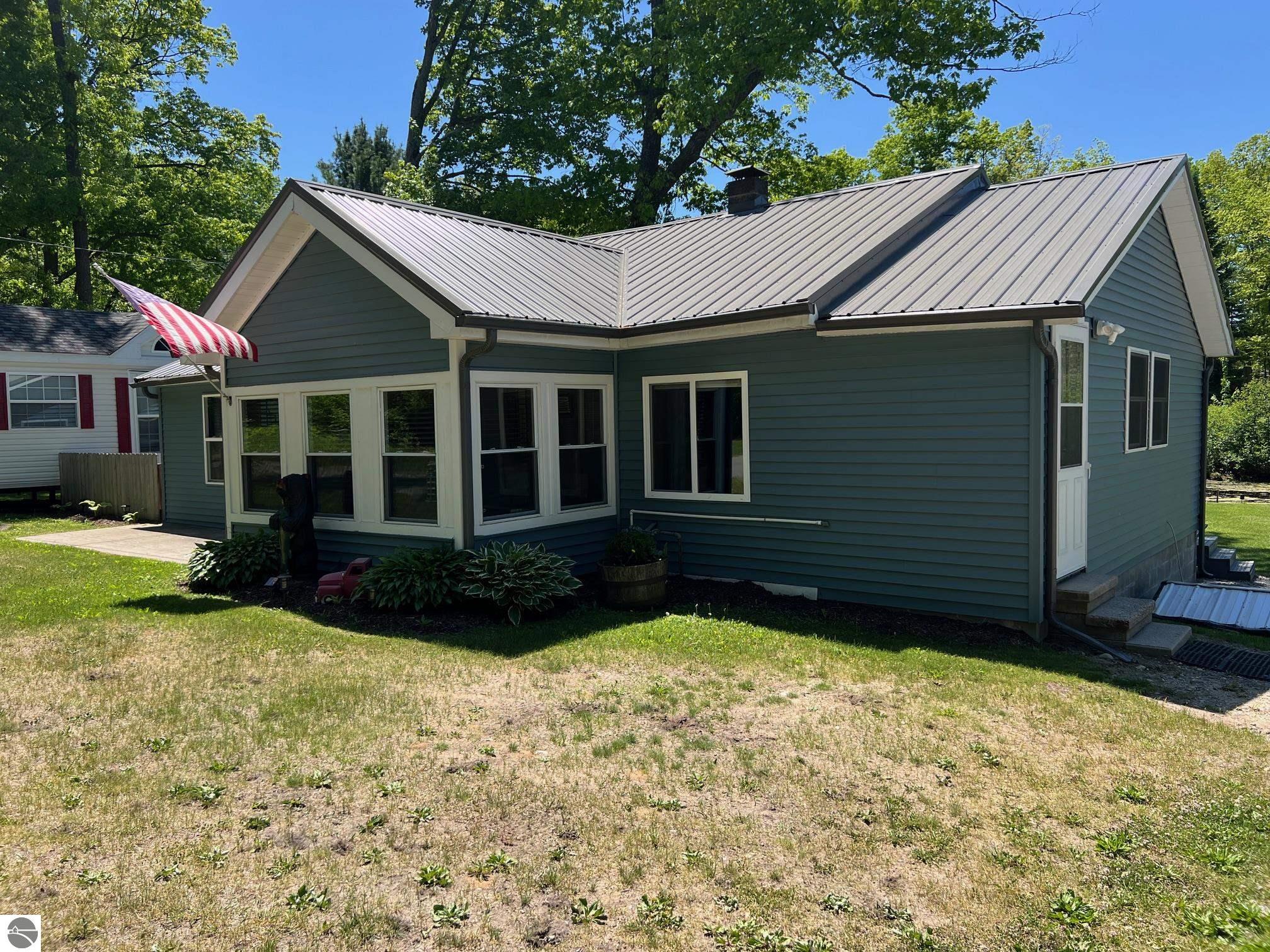 1444 Bungo Trail, Harrison, MI 48625