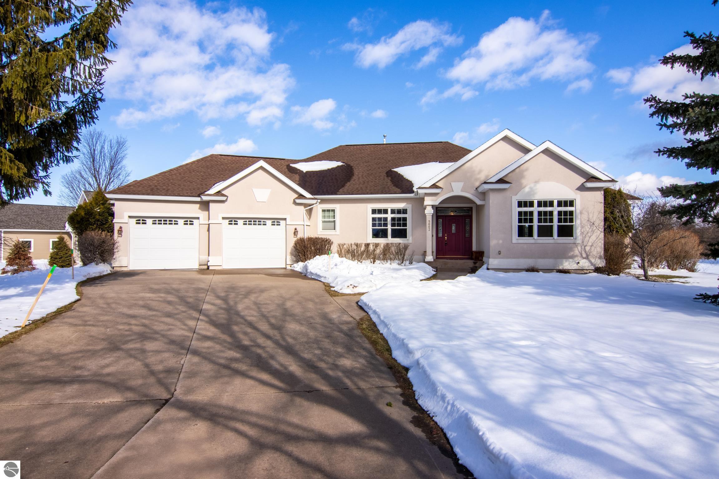 5002 Arrowhead Circle, Williamsburg, MI 49690 — front exterior