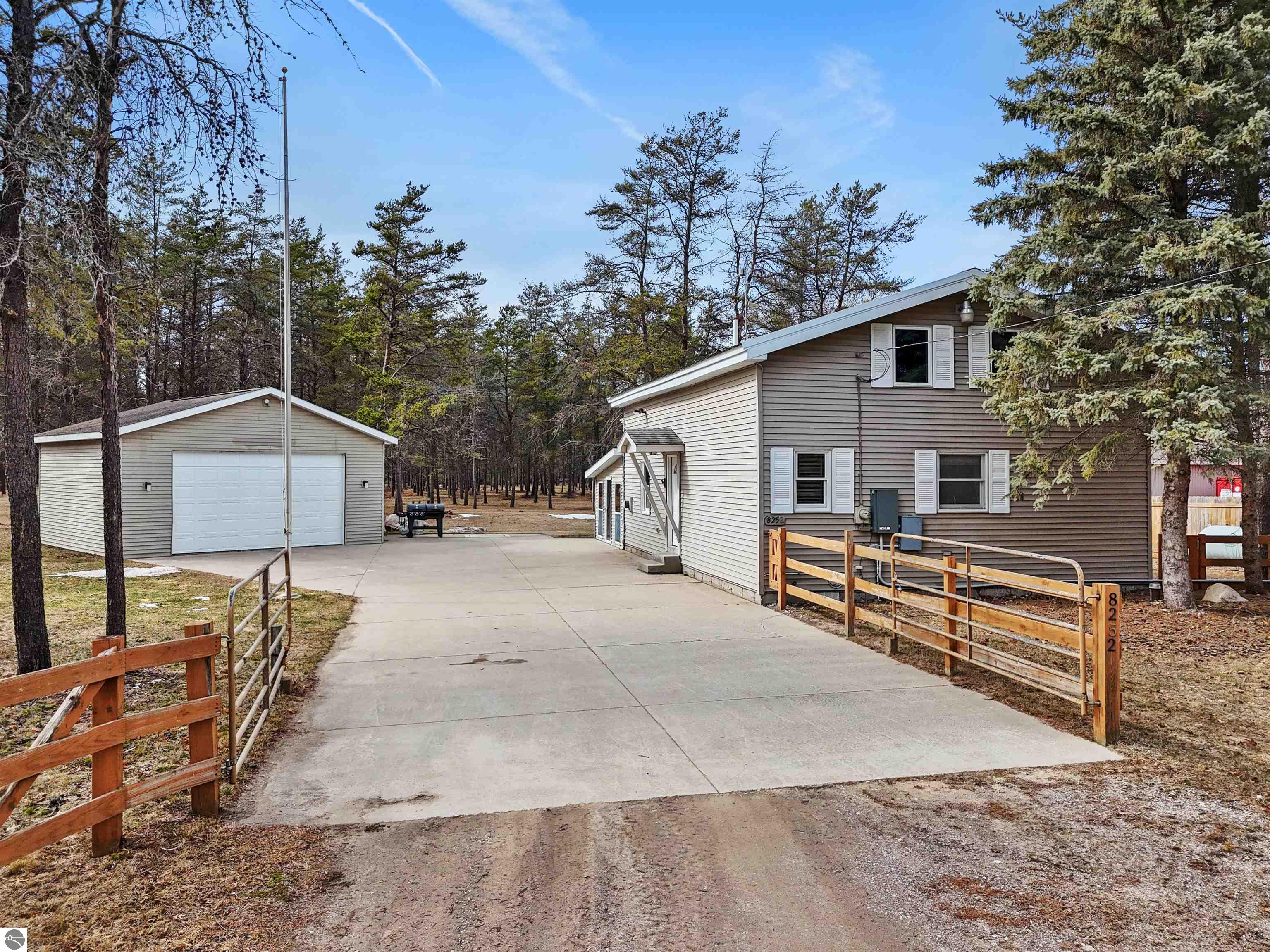 8252 Vans Trail, Marion, MI 49665 — front exterior
