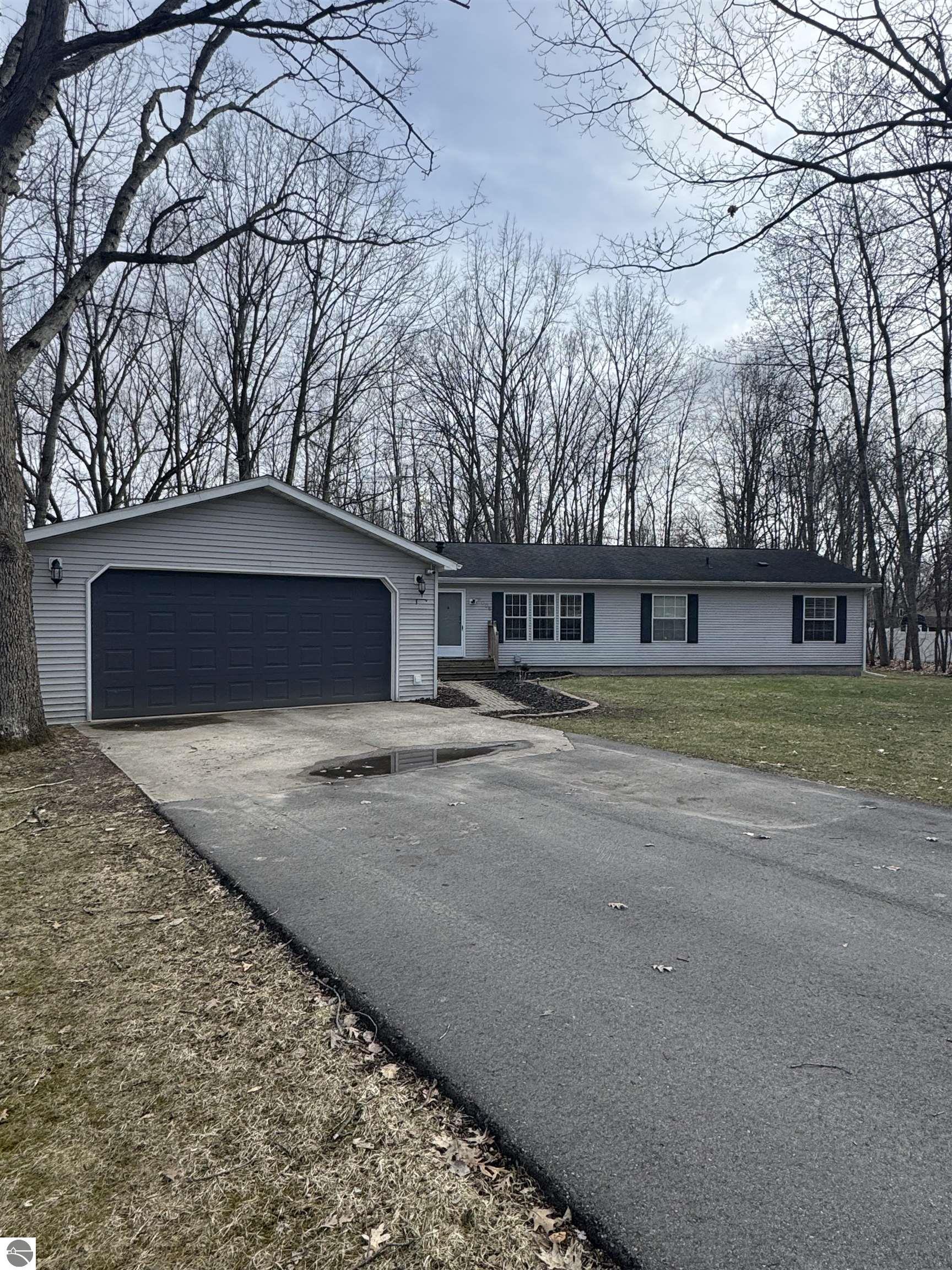 2006 Duquesa Court, Lake Isabella, MI 48893 — front exterior