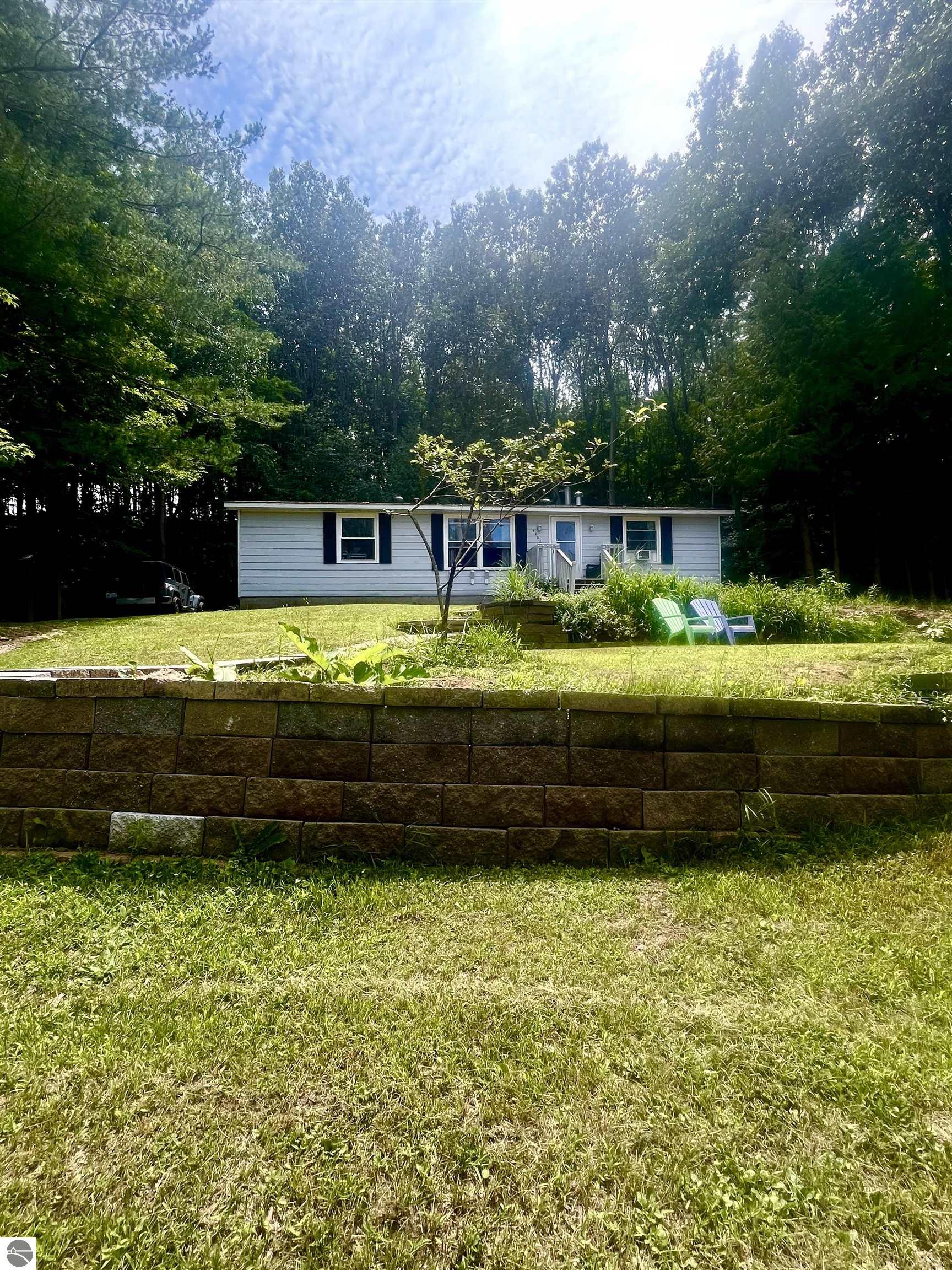 9452 N Manitou Trail, Northport, MI 49670 — front exterior