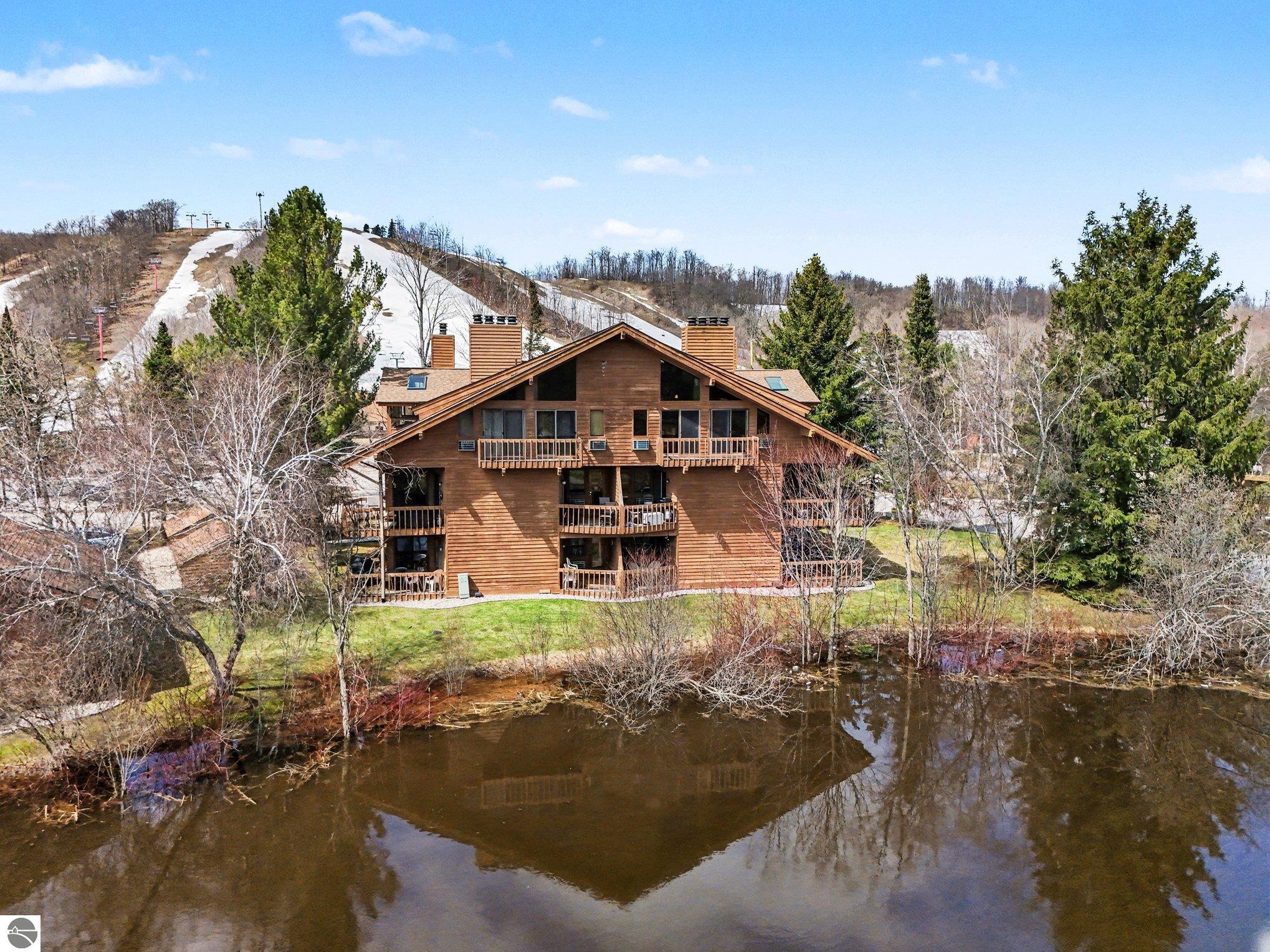 6520 Schuss Mountain Lane, Mancelona, MI 49659 — front exterior