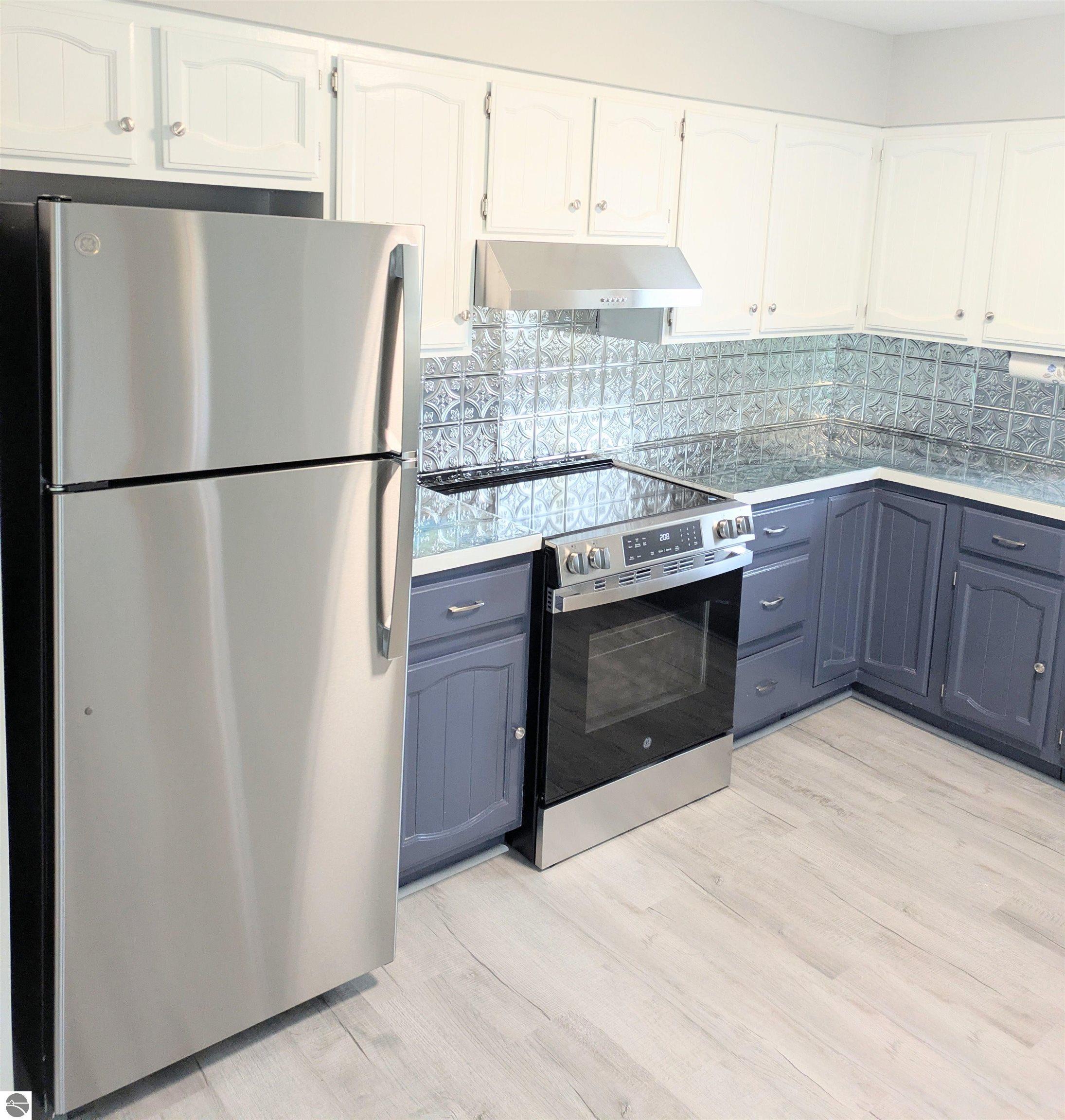 408 Sunnyside, Mancelona, MI 49659 — Photo 2