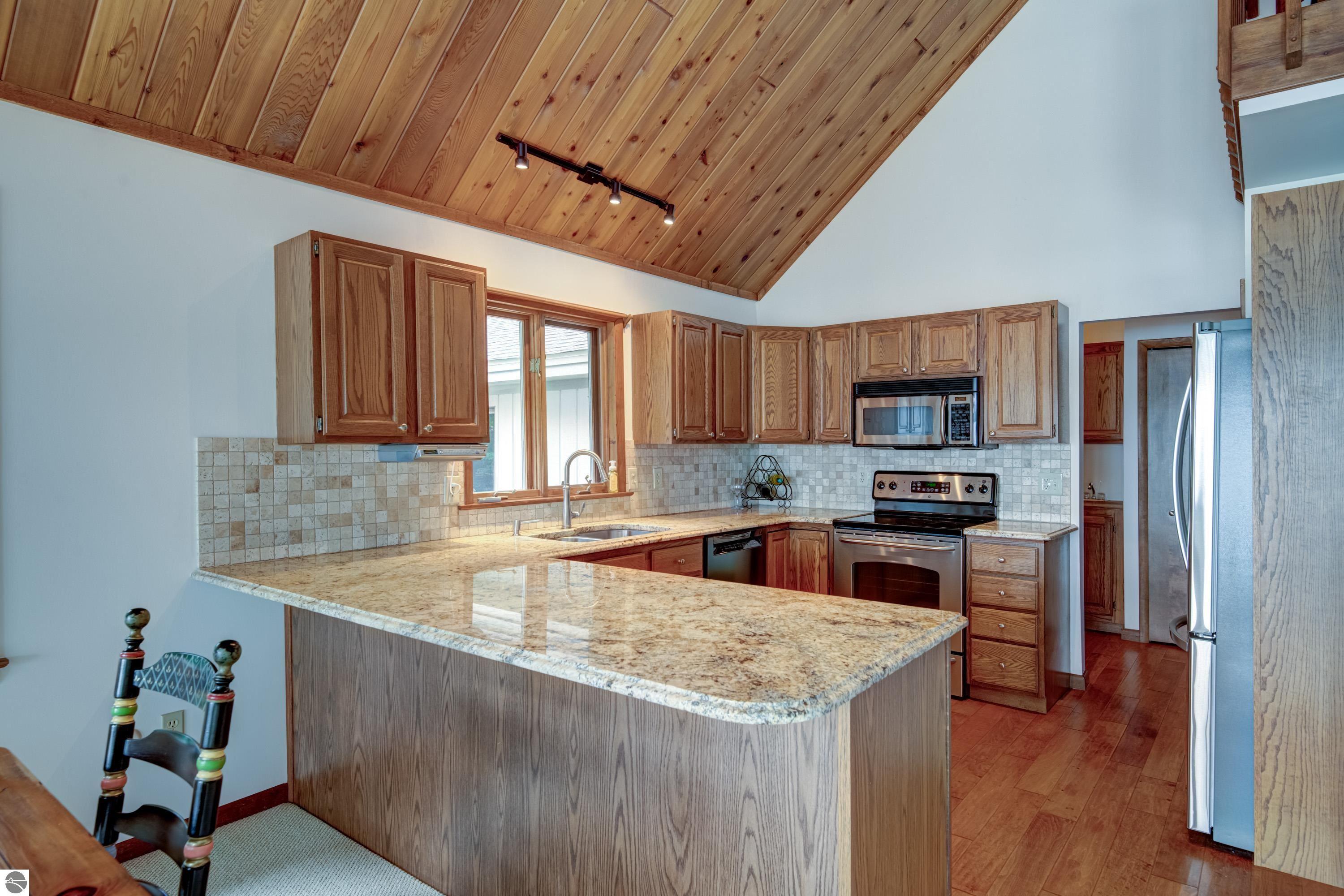 2447 N West Torch Lake Drive, Kewadin, MI 49648 — Photo 11