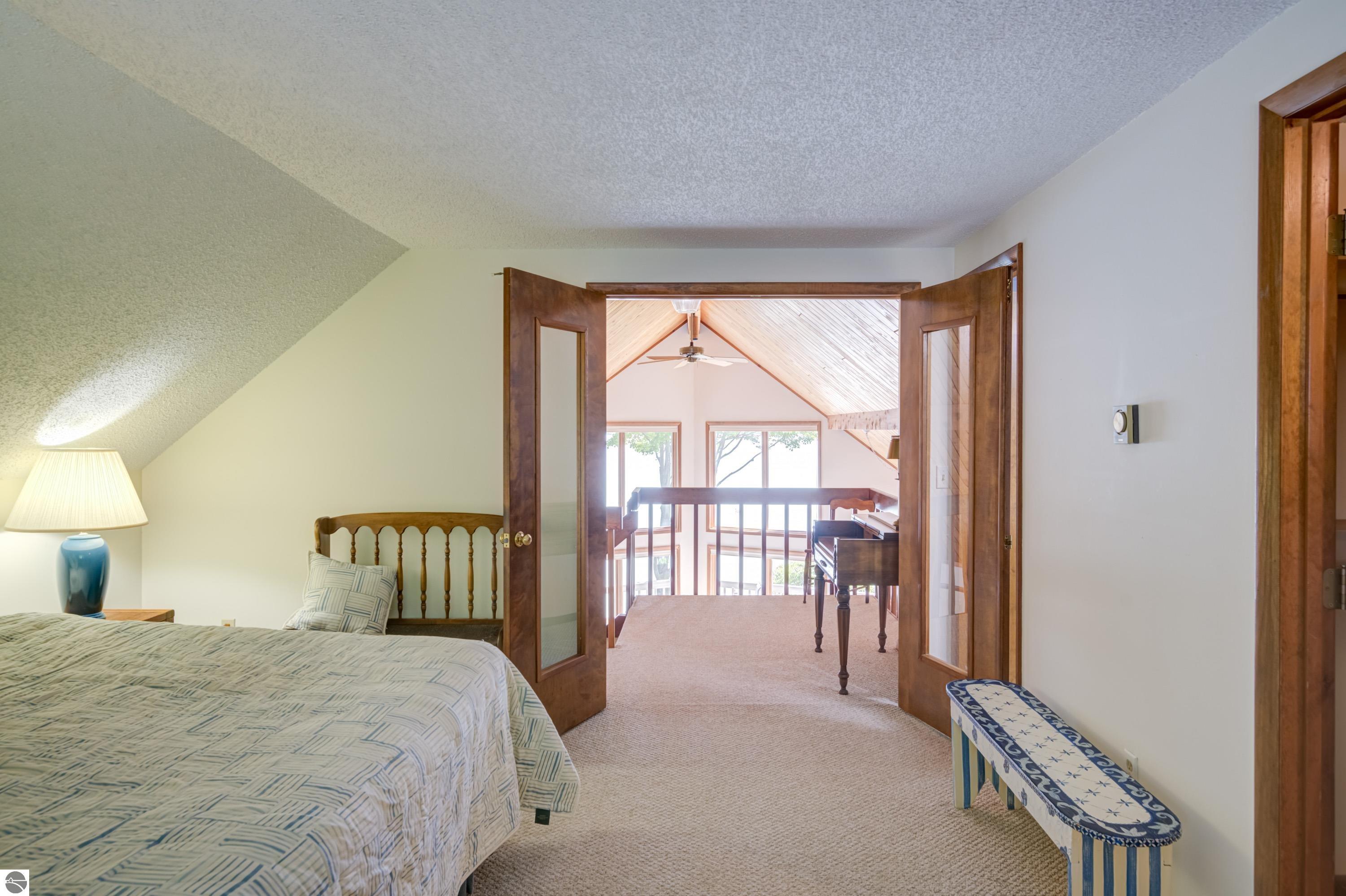 2447 N West Torch Lake Drive, Kewadin, MI 49648 — Photo 20