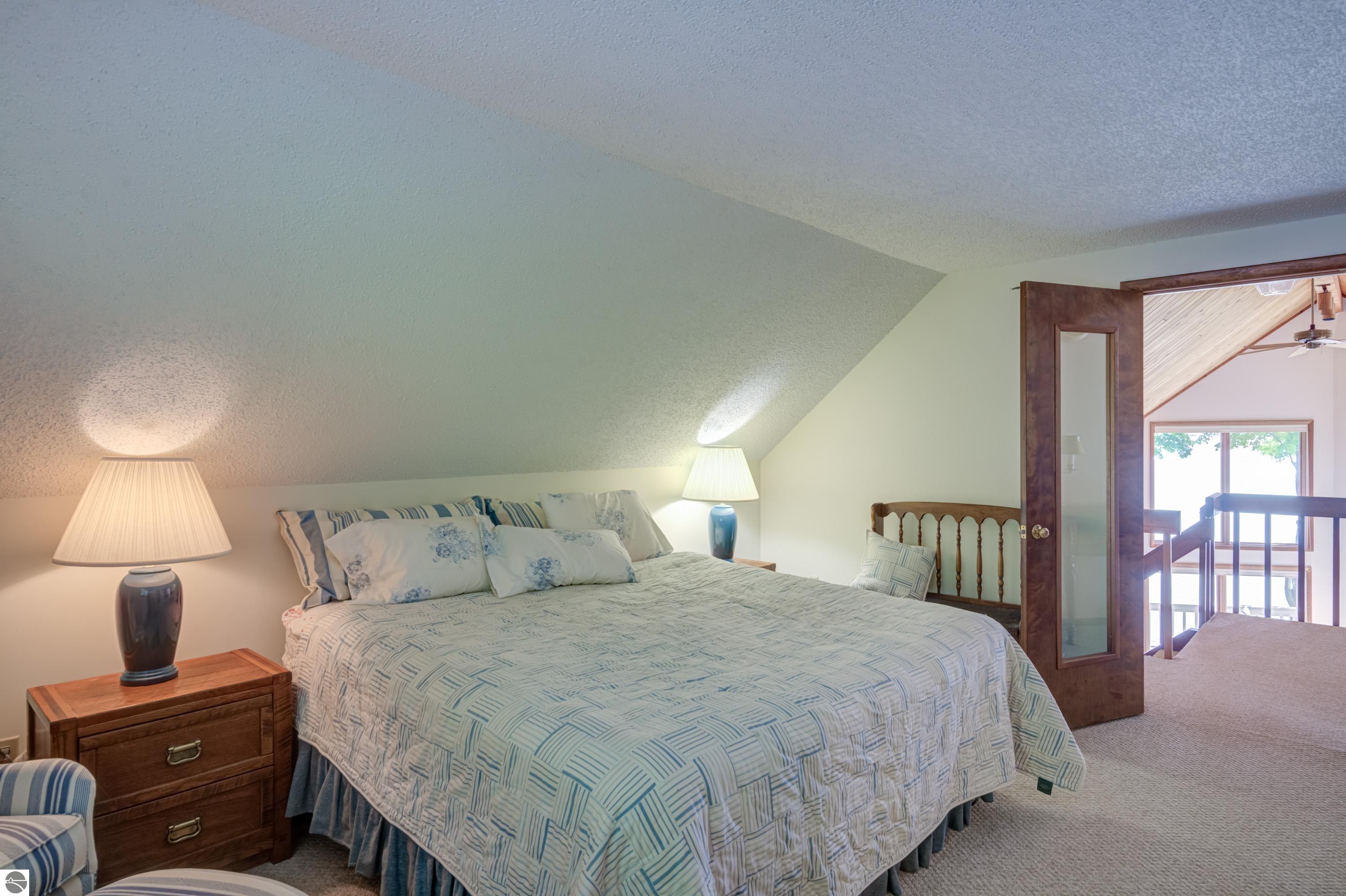 2447 N West Torch Lake Drive, Kewadin, MI 49648 — Photo 21