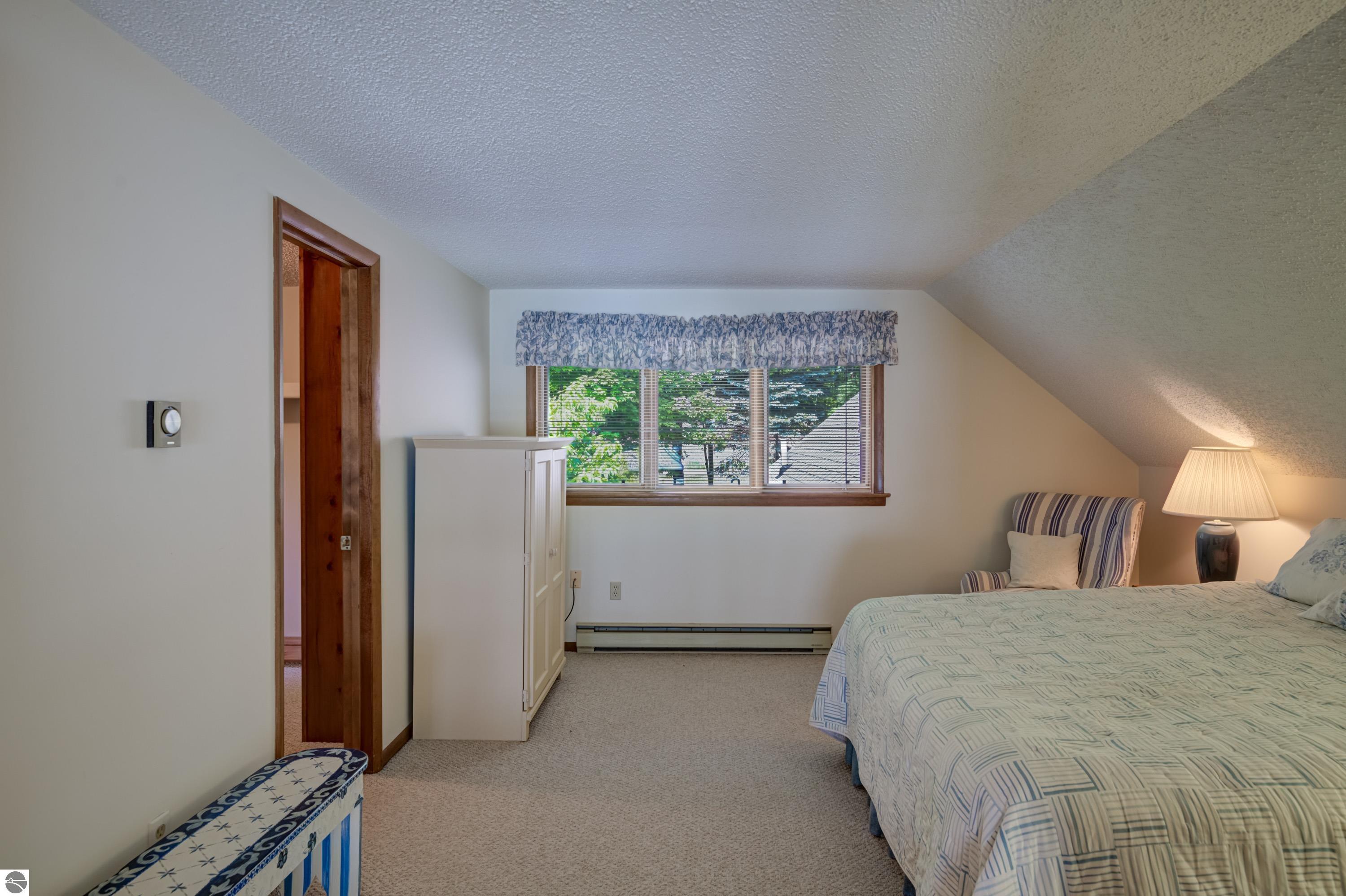 2447 N West Torch Lake Drive, Kewadin, MI 49648 — Photo 25