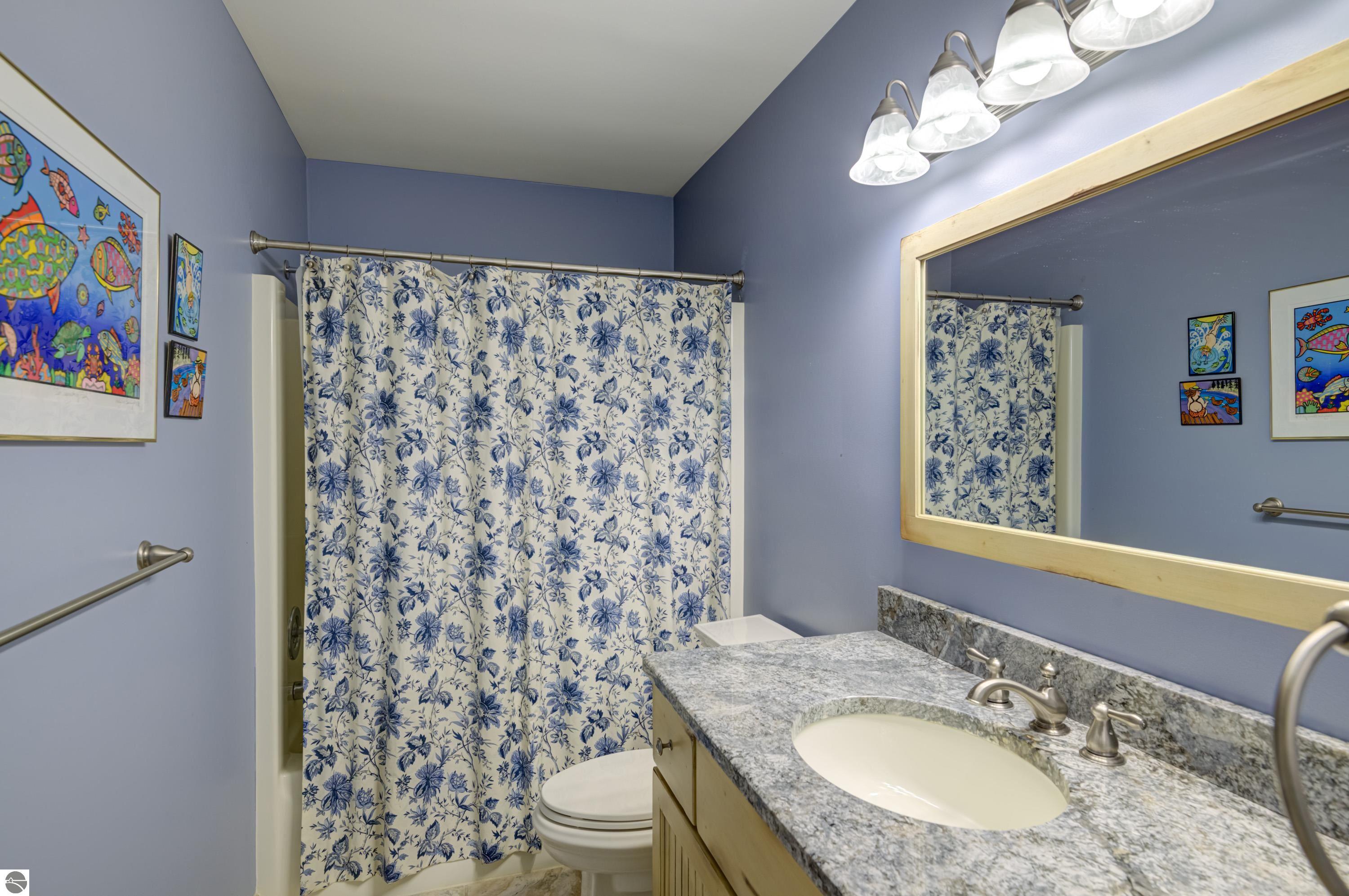 2447 N West Torch Lake Drive, Kewadin, MI 49648 — Photo 26
