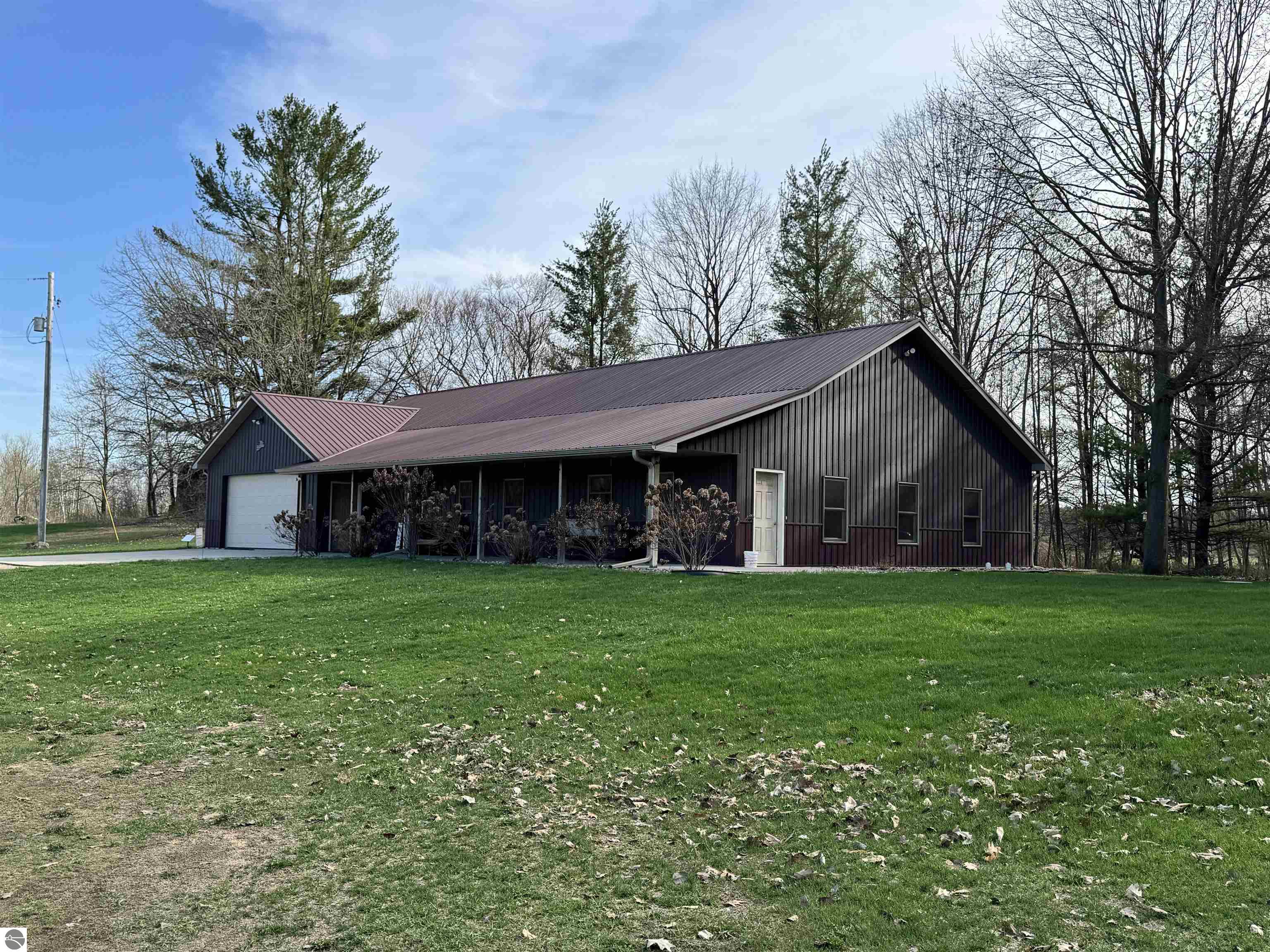 7765 N Summerton Road, Clare, MI 48617 — front exterior