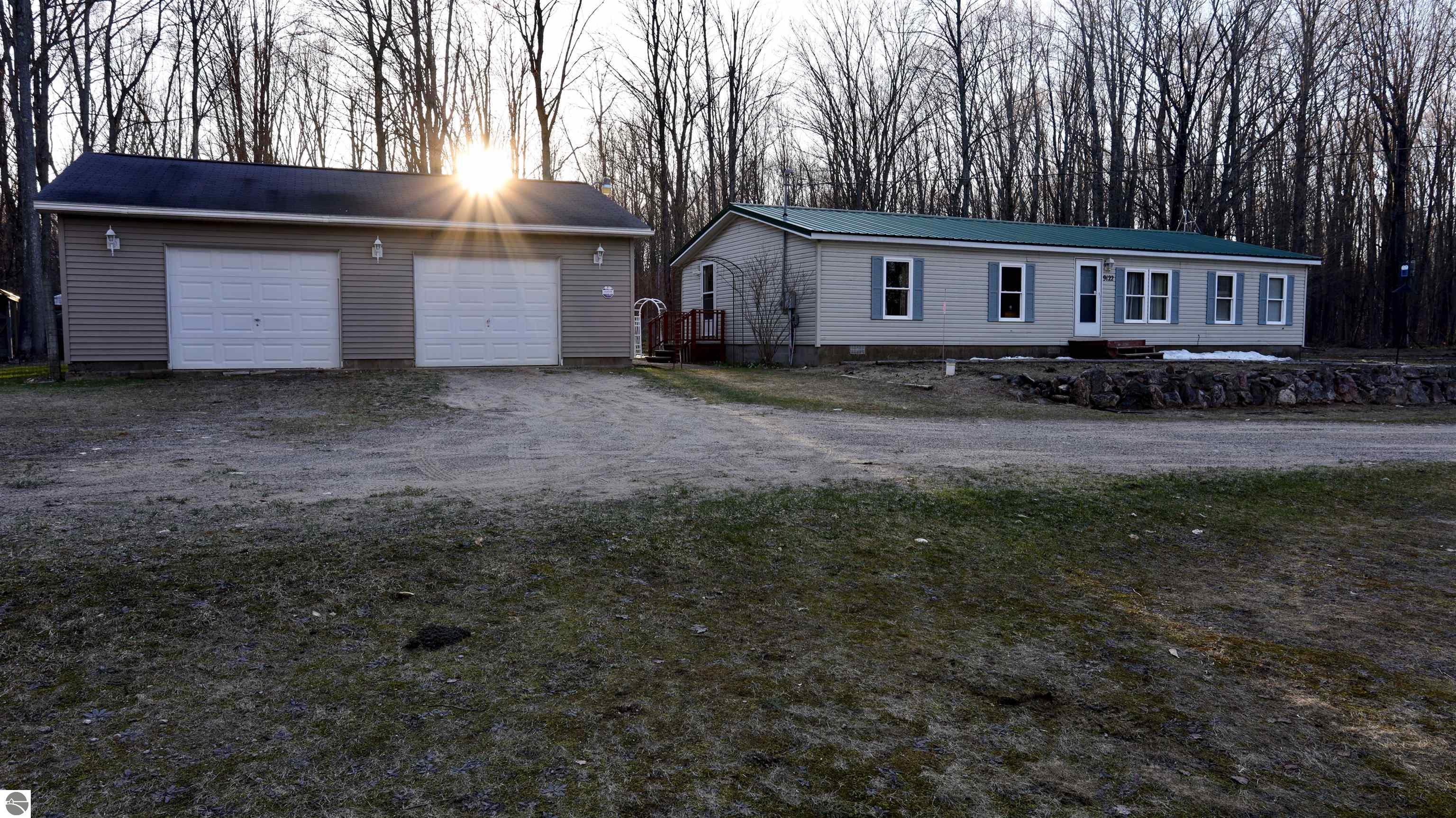 9122 Grimm Lane, Mancelona, MI 49659 — front exterior