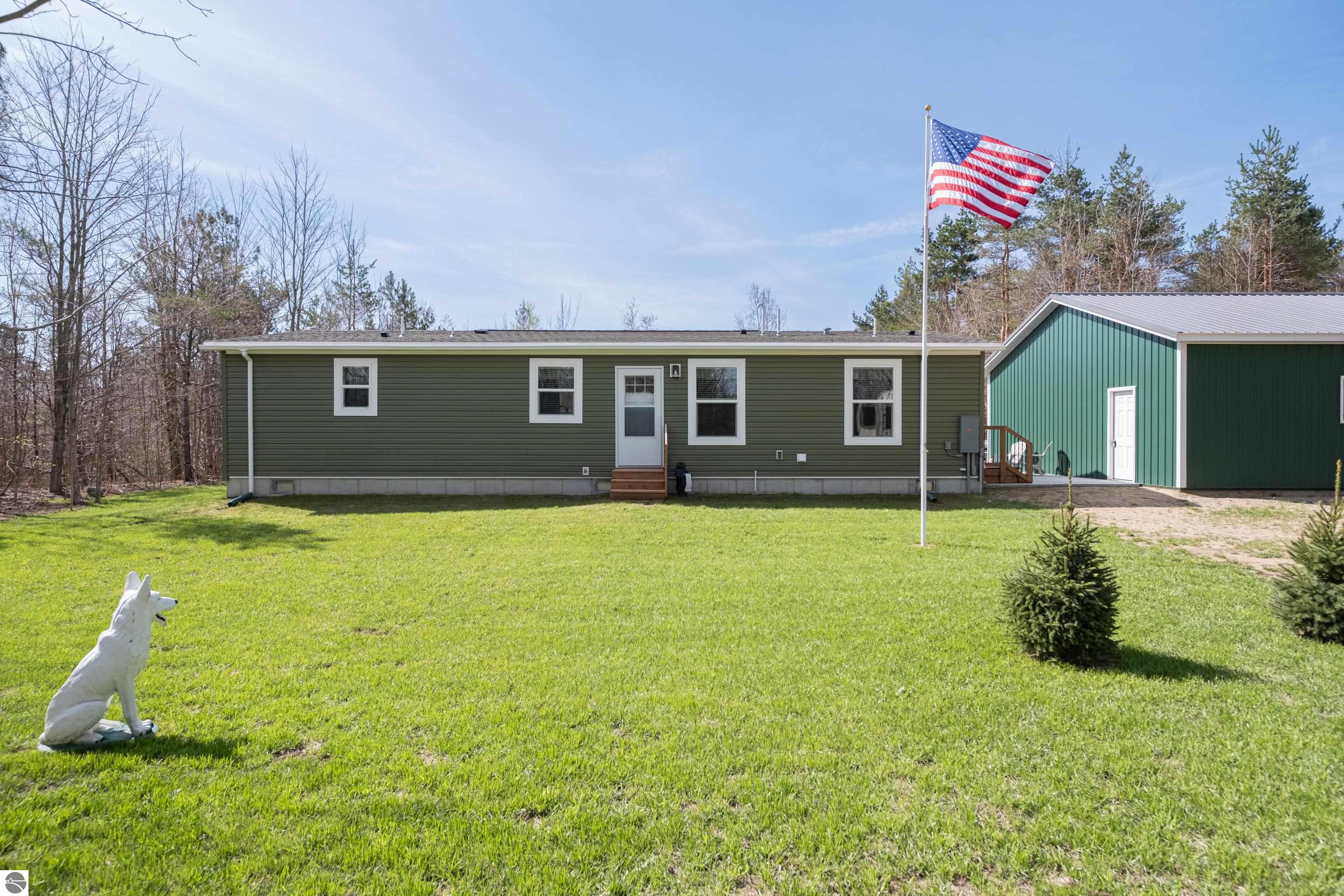 1217 Tremblay Road, Mancelona, MI 49659 — front exterior