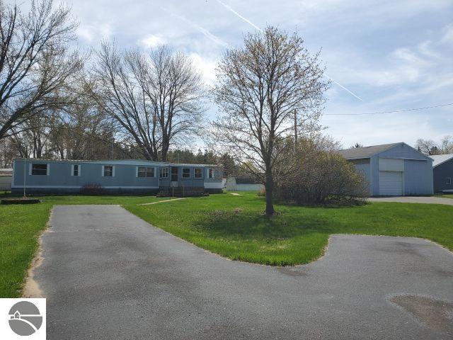 2890 Twin Lake Road, Lupton, MI 48635 — front exterior