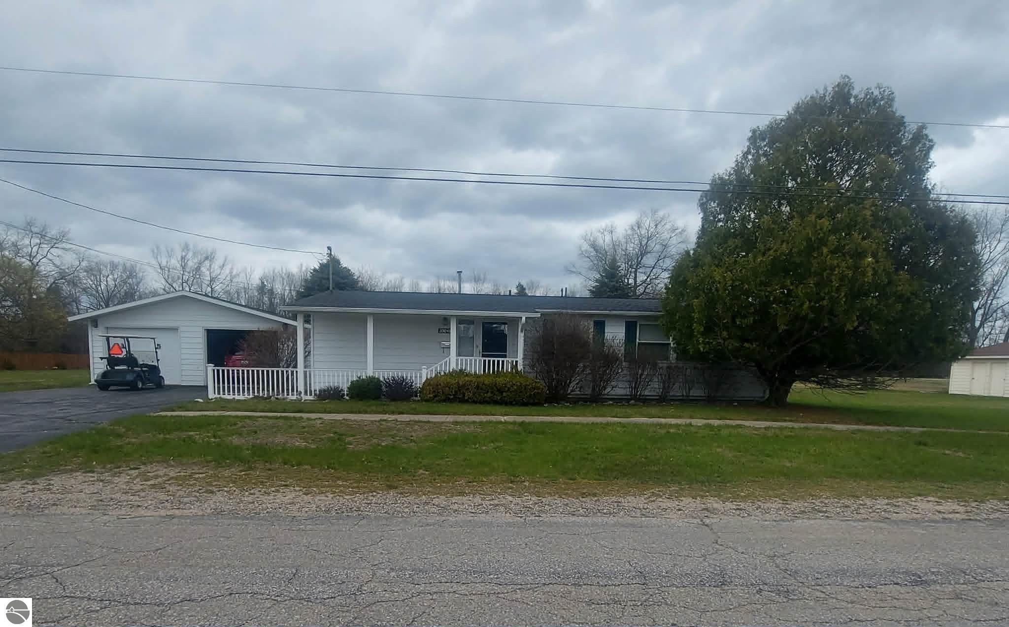 10048 8th Street, Oscoda, MI 48750 — front exterior