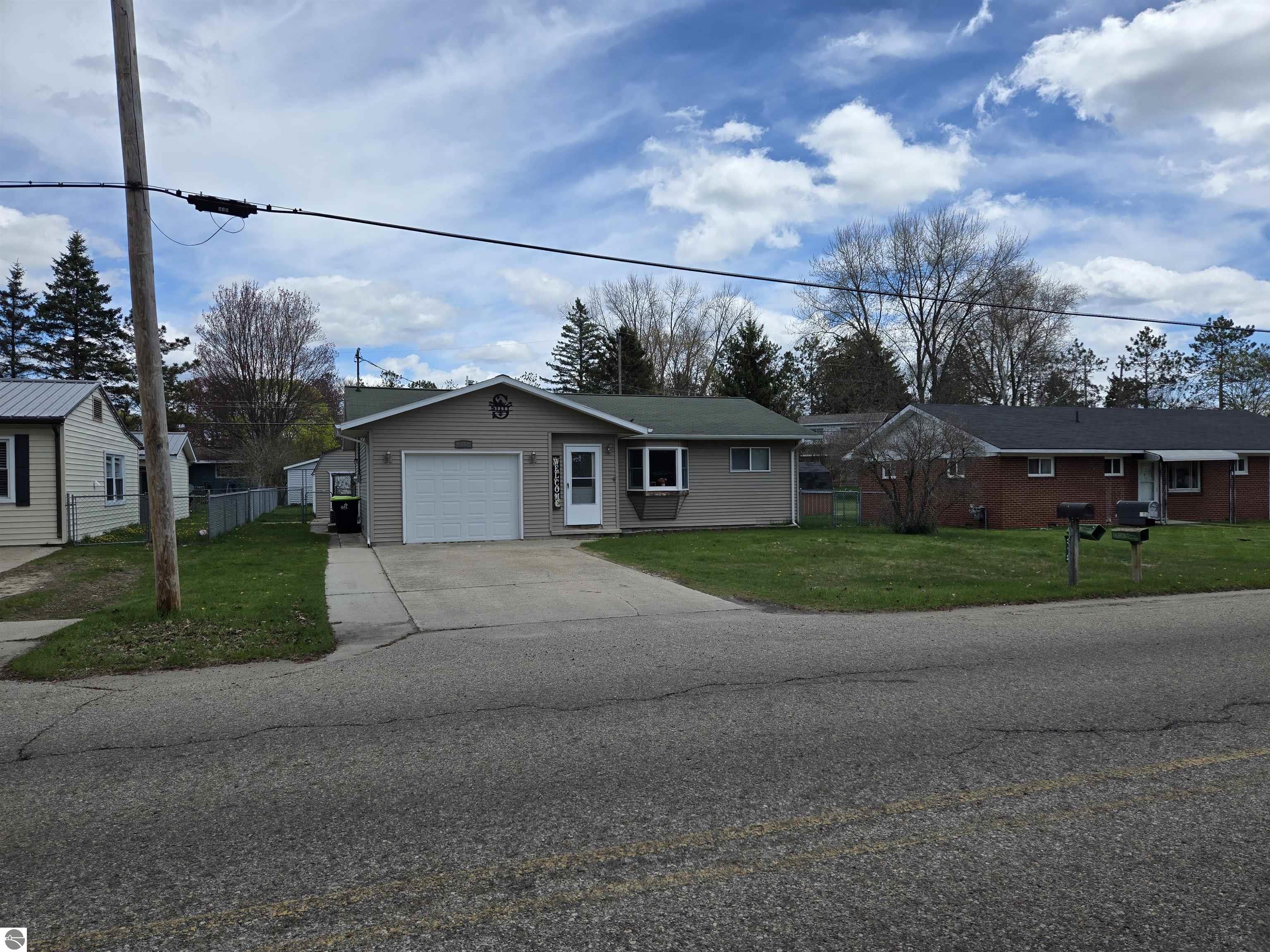 312 Bridge, East Tawas, MI 48730 — front exterior
