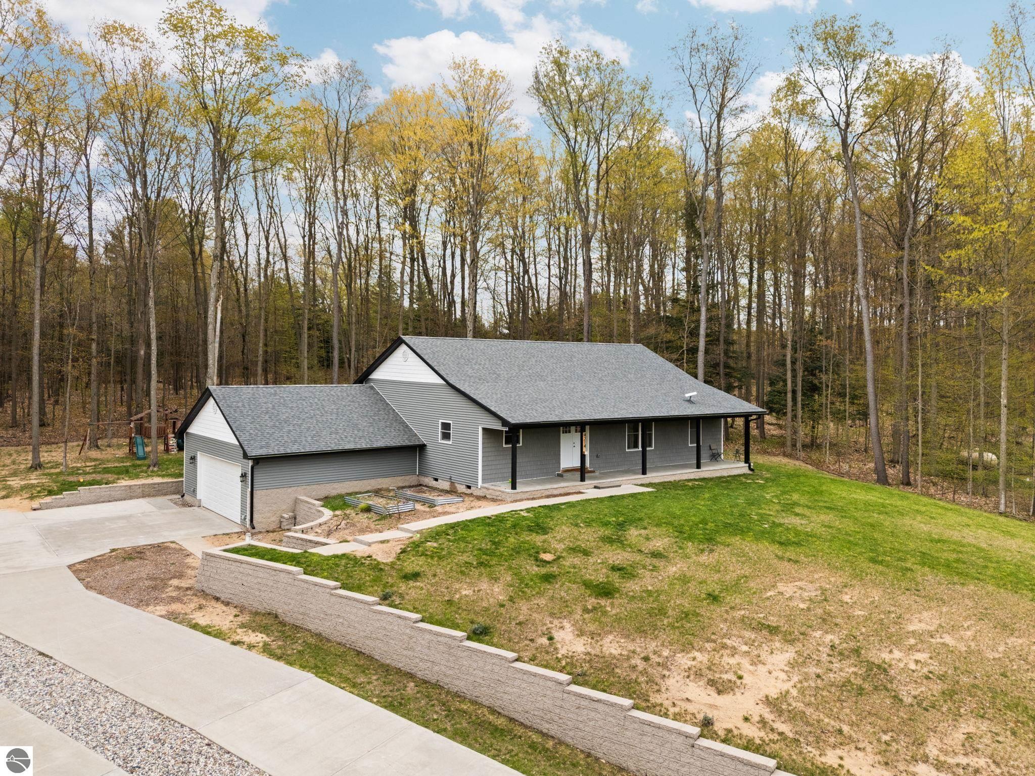 4214 Antioch Drive, Mesick, MI 49668 — front exterior