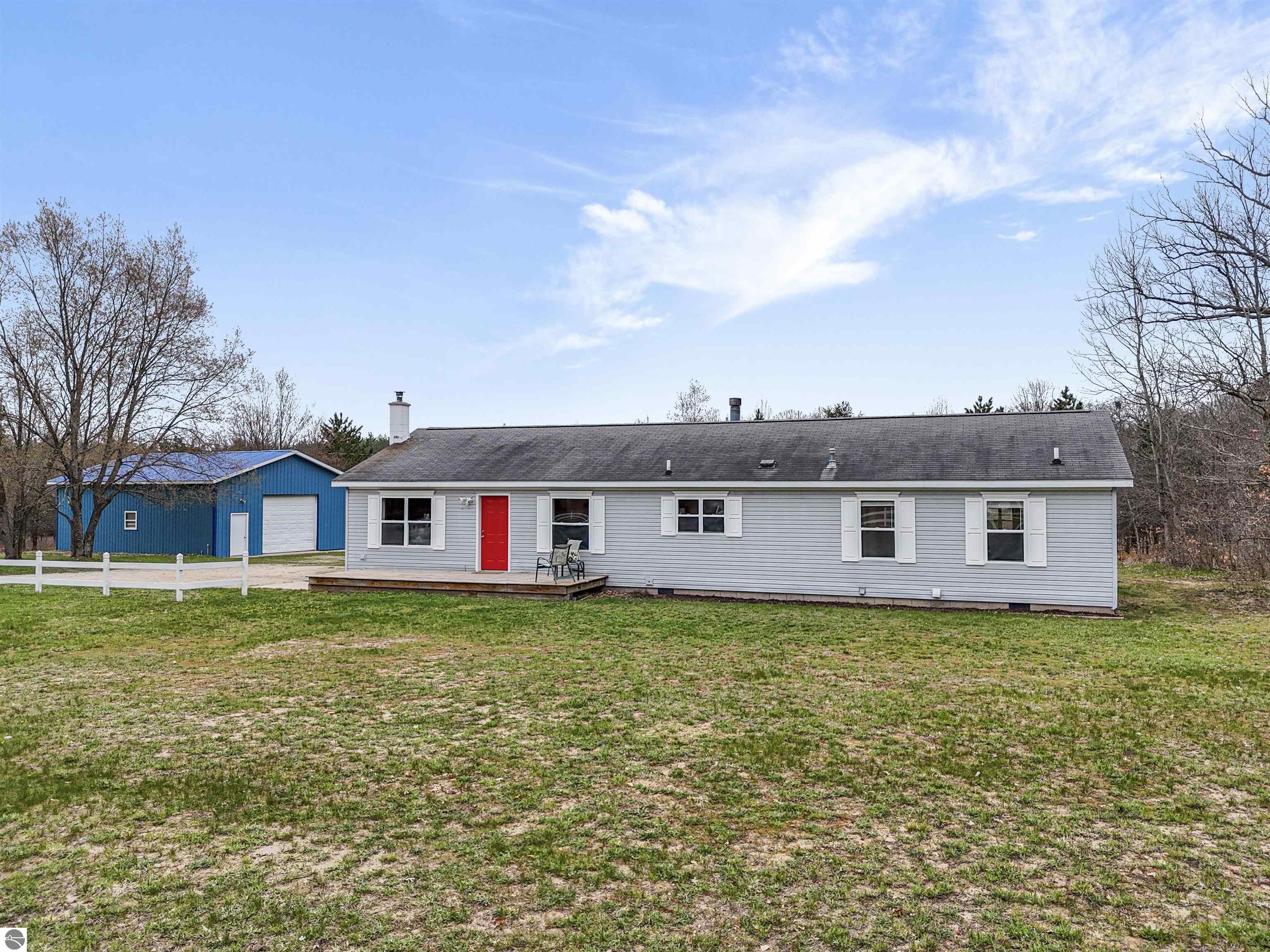 9562 E M-113, Fife Lake, MI 49633 — front exterior