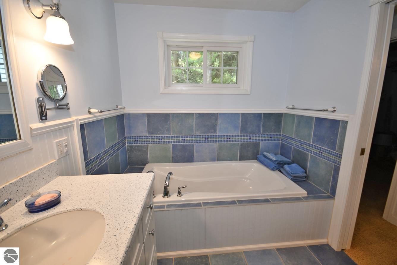 4515 W Glen Eden Drive, Glen Arbor, MI 49636 — Photo 47